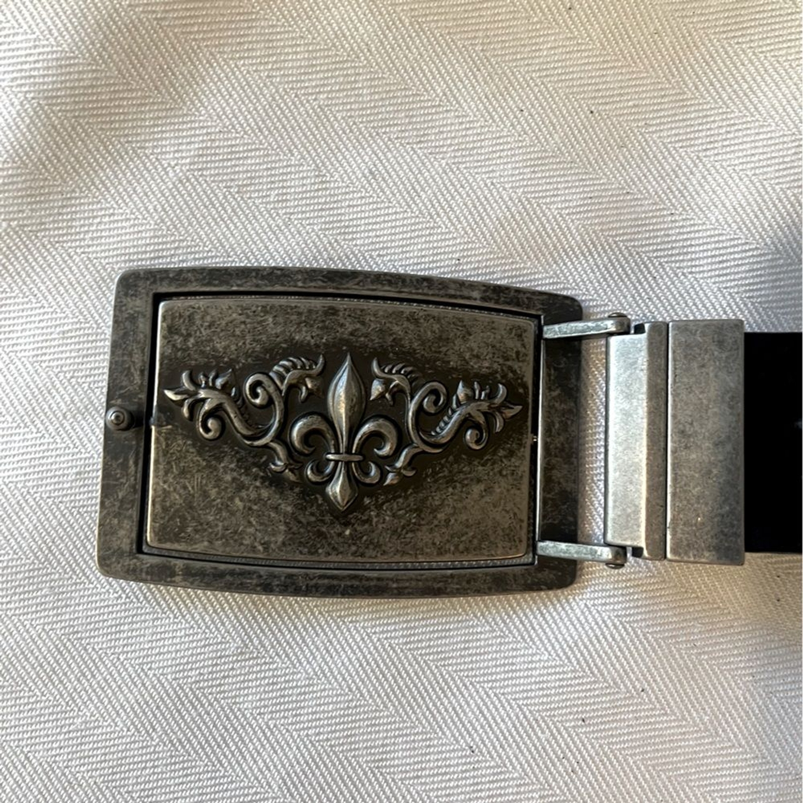 Fleur de Lis reversible pewter type belt buckle. Monogram M on the reverse side
