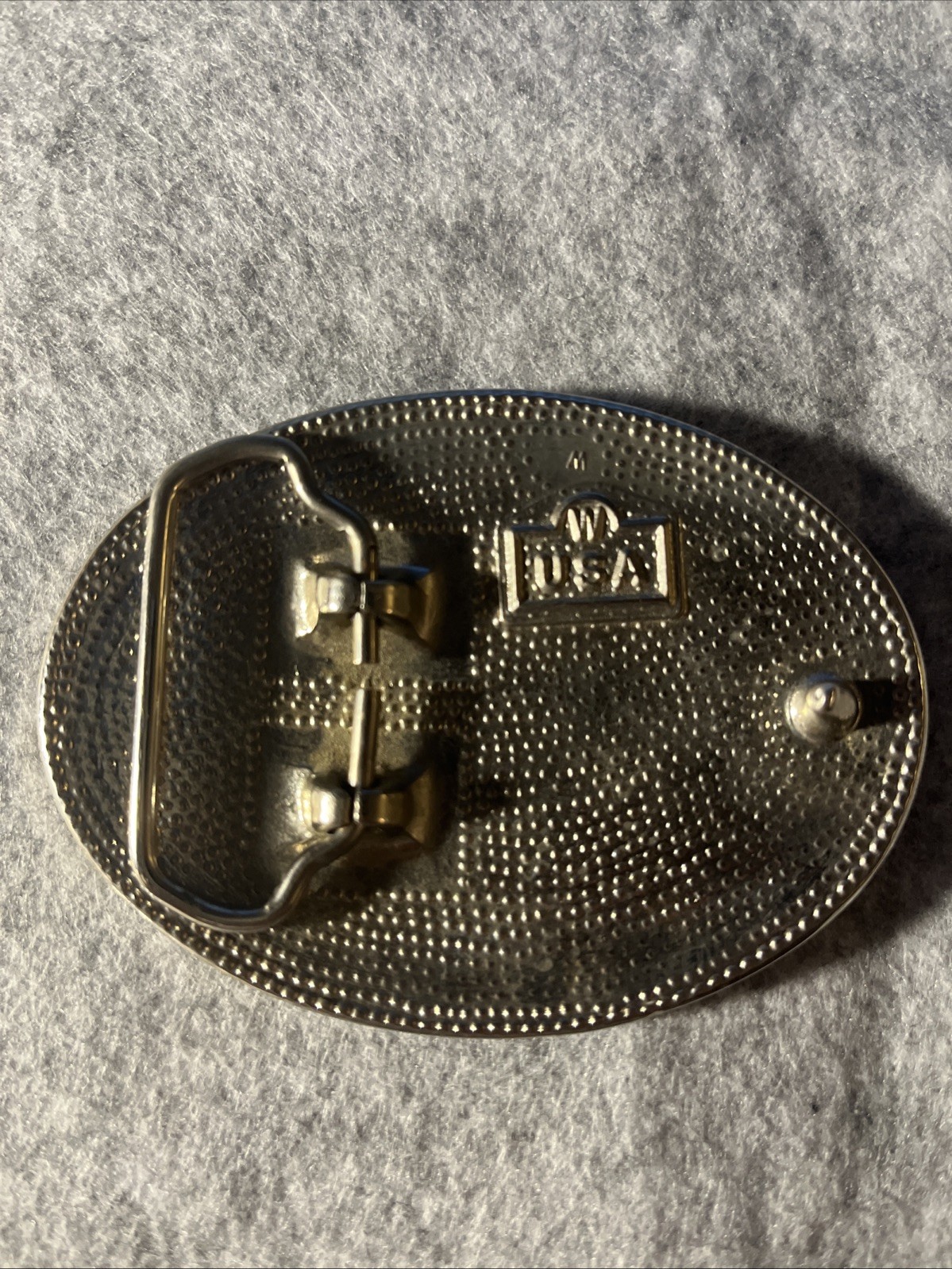 Silver-toned Belt Buckle with Black Enamel and Flying Eagle. Made in USA.