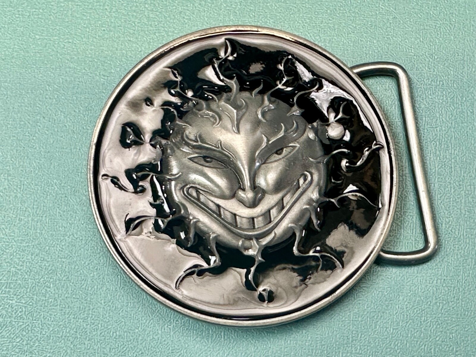 Falling Evil Sun Face – Solar Flare Black Color Belt Buckle By Buckle Rage