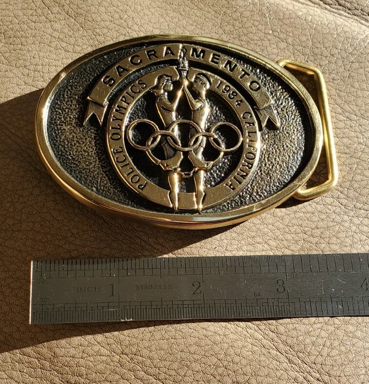 1984 Sacramento Police Olympics Beltbuckle, Vintage Unsued. Solid Brass.