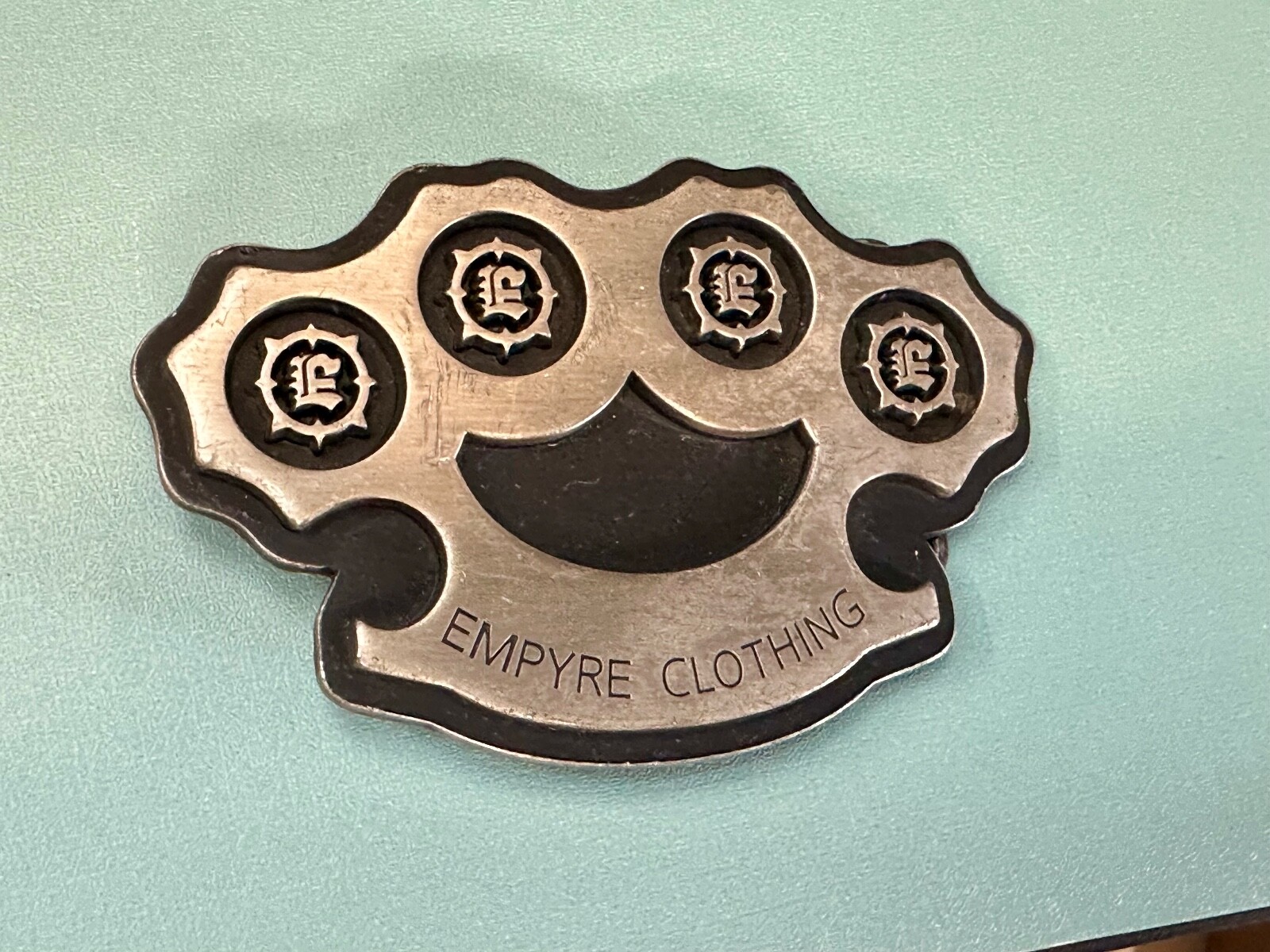 Empire Clothing Knuckles Cut Out Belt Buckle Company Advertising Promo