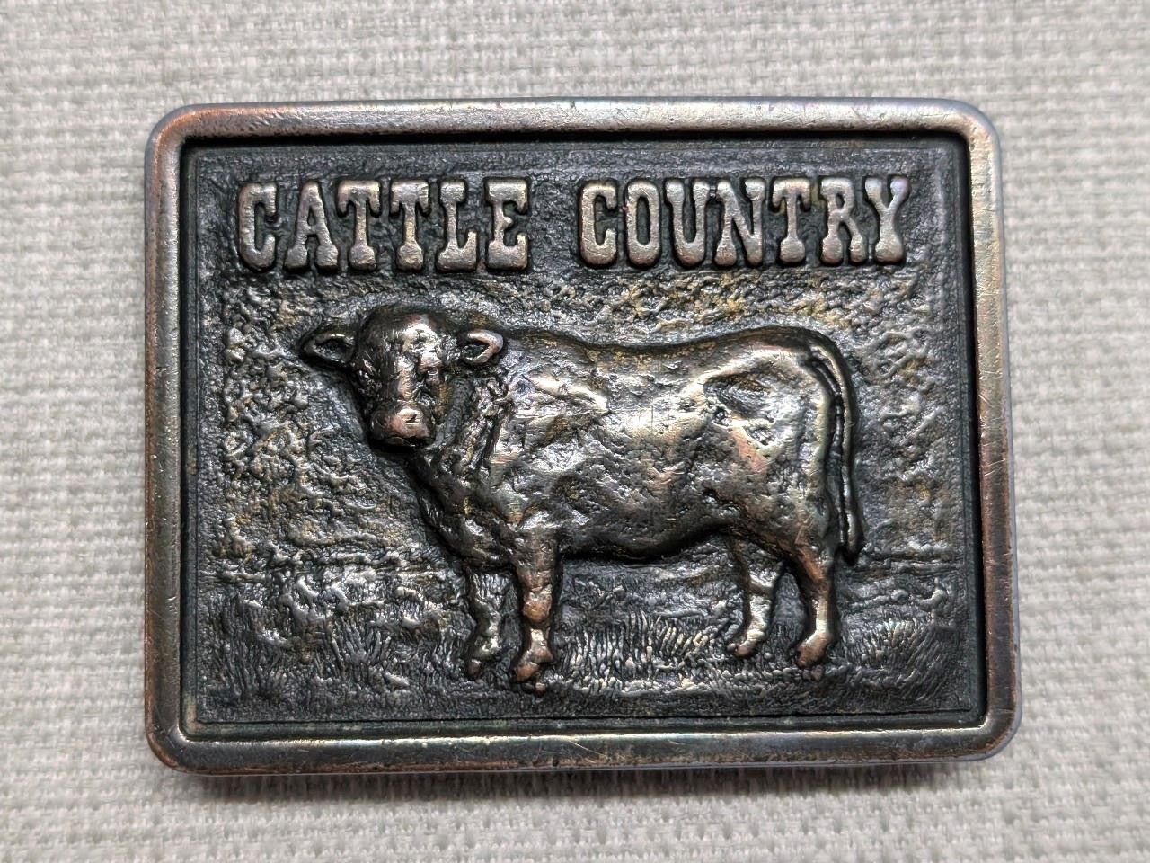vintage CATTLE COUNTRY belt buckle BRASS cargill COW nutrena WESTERN cowboy