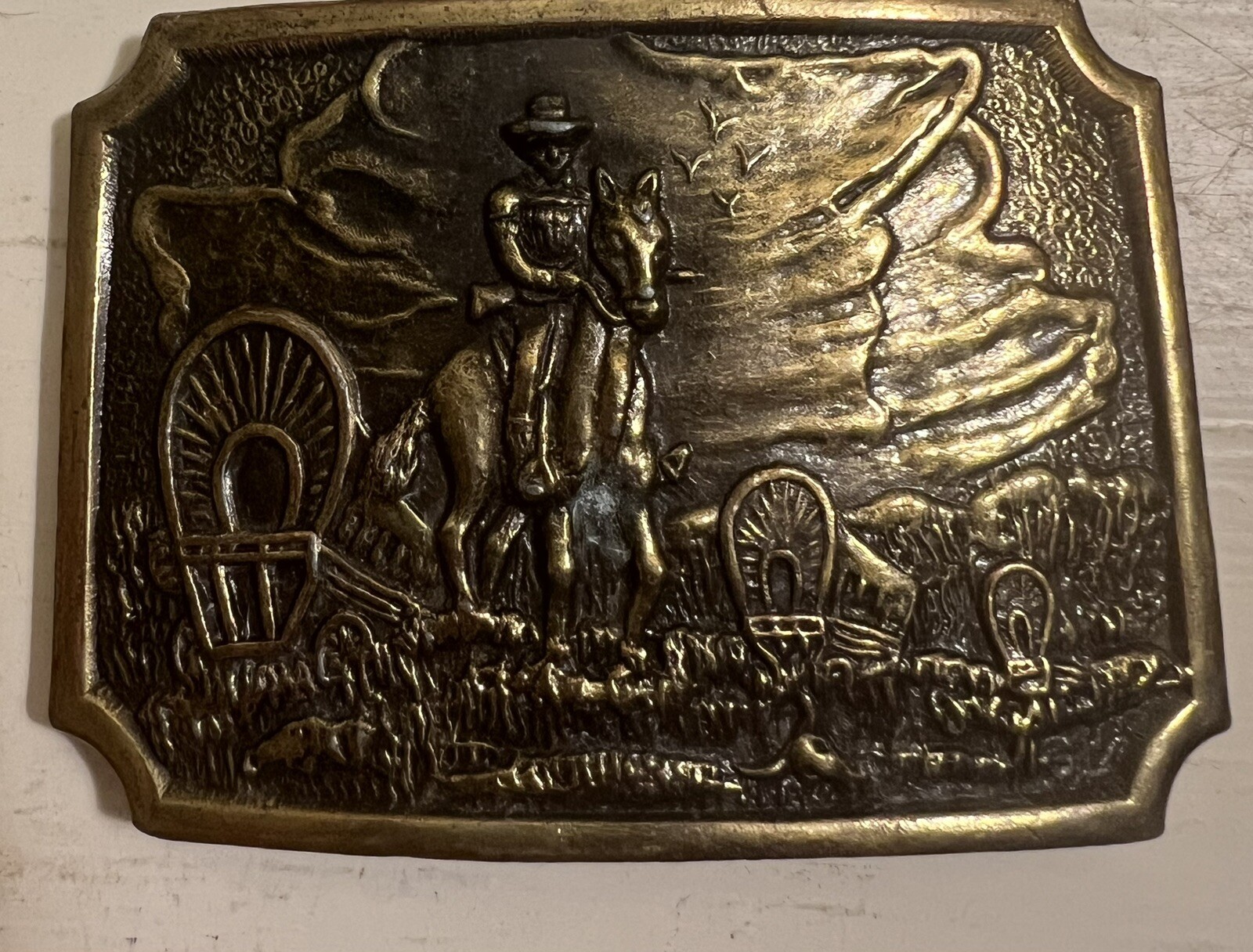 Belt Buckle With A Man And A Horse On It