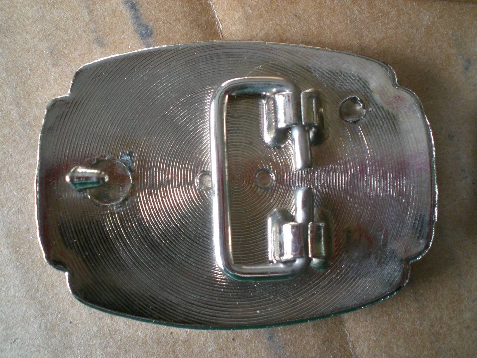 2 silver tone shiny belt buckles