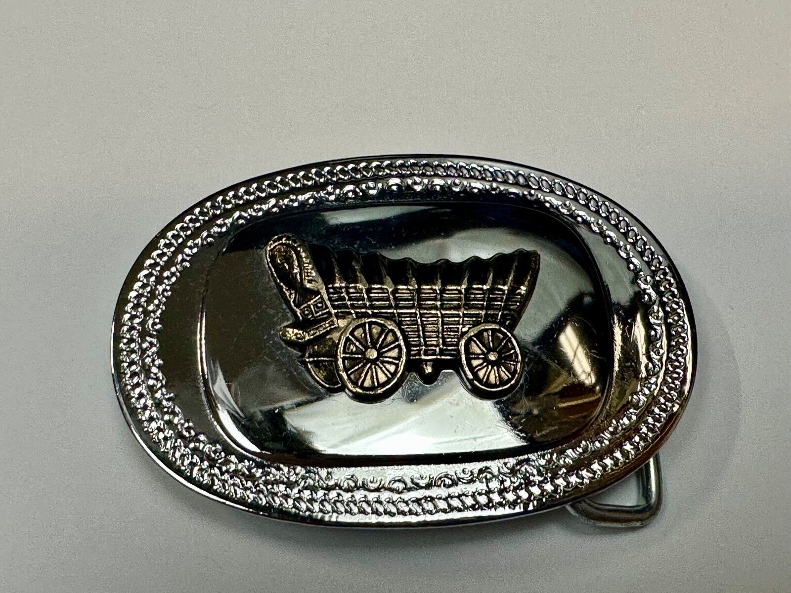 Vintage Covered Wagon On Reflective Oval Two Tone Western Belt Buckle