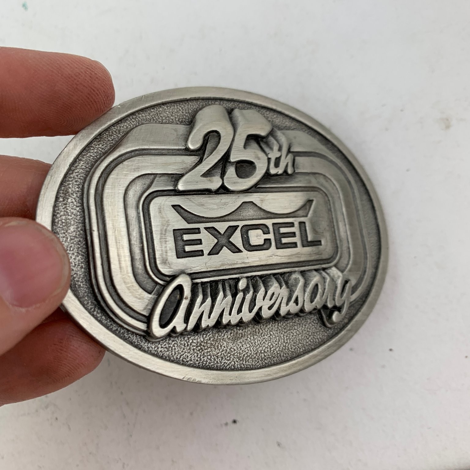 Excel 25th Anniversary Belt Buckle Silver Tone Oval Limited Edition 1985