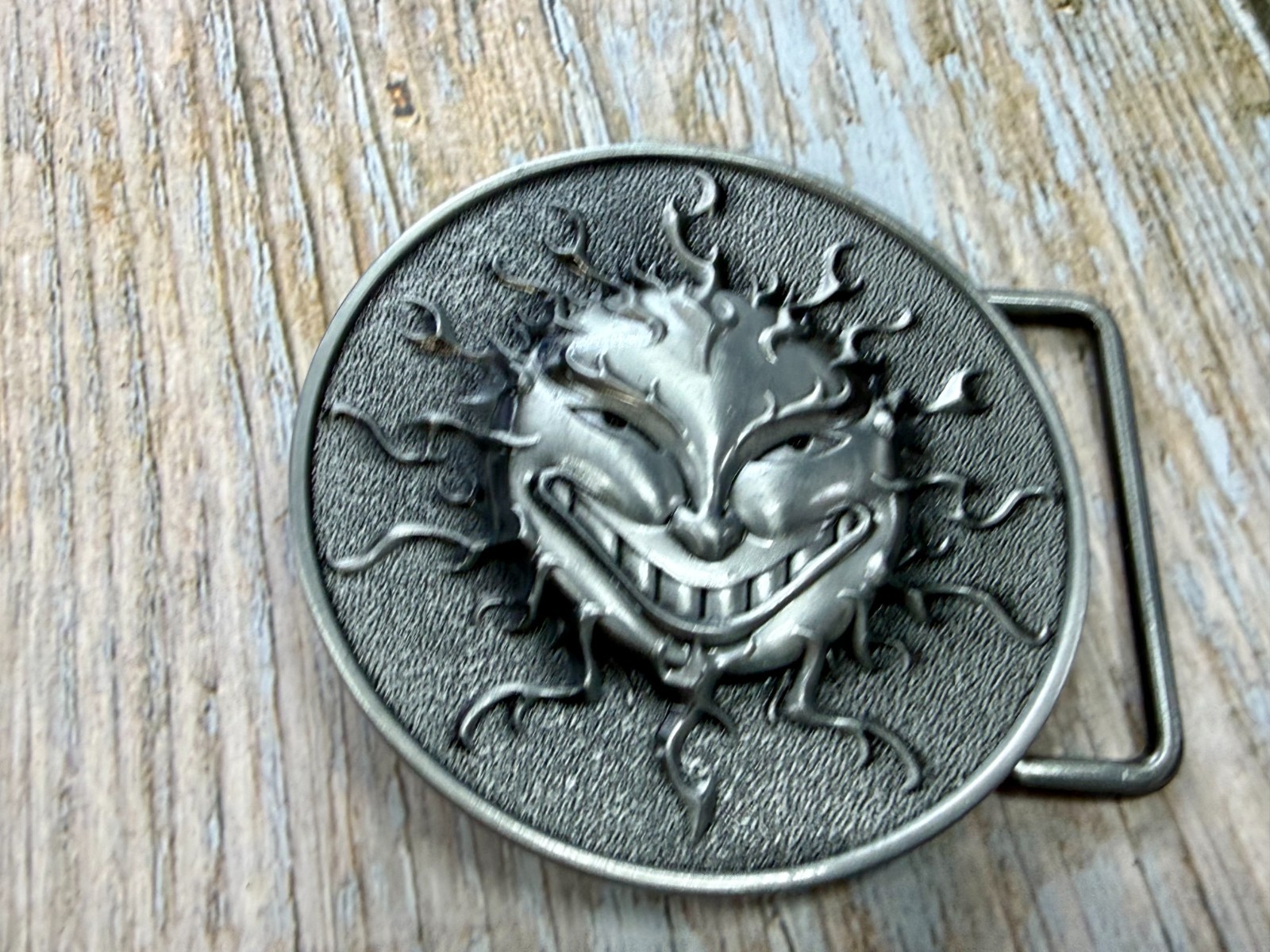 Flaming Sun Solar Flare Grinning Creepy Smile Novelty Belt Buckle by Buckle Rage