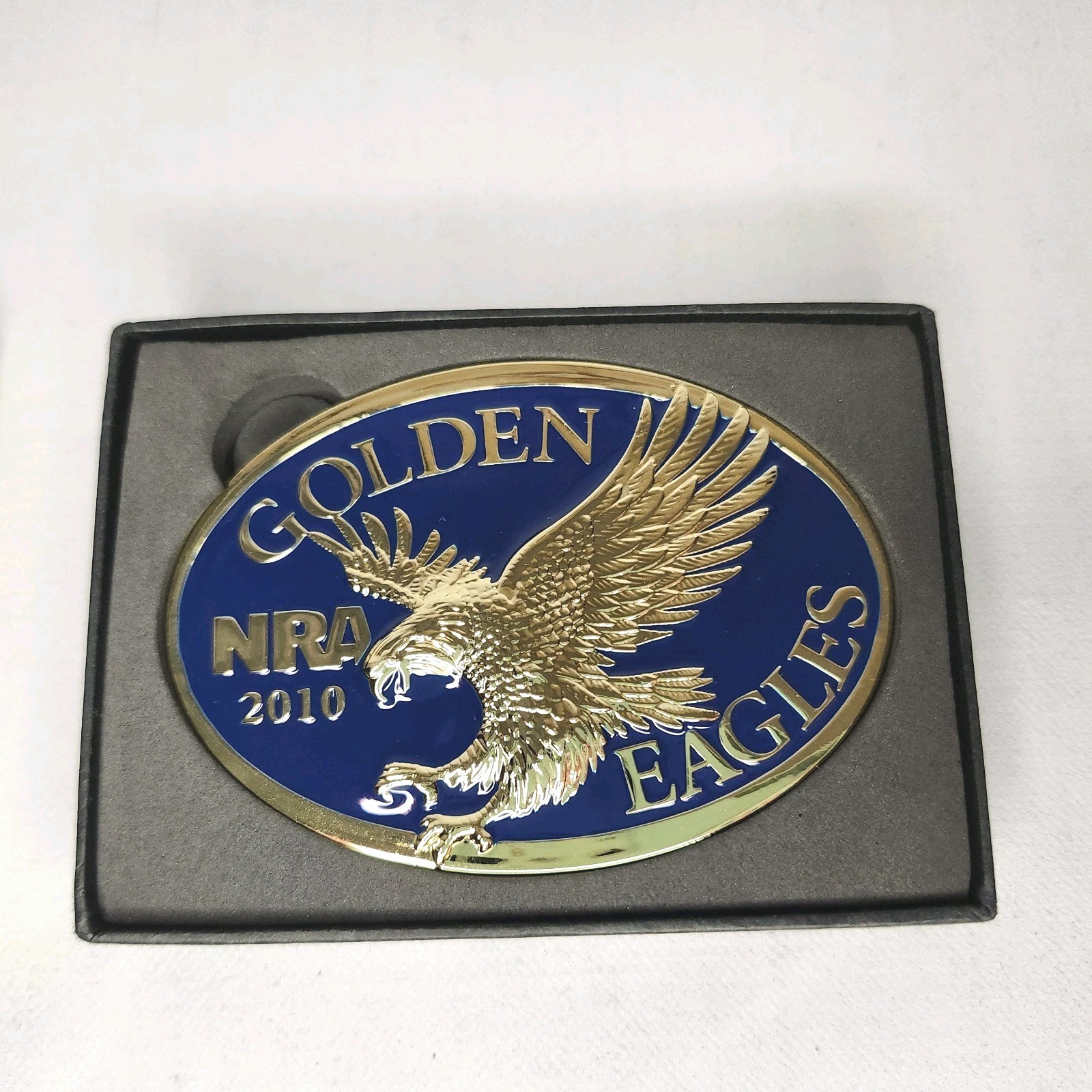 NRA Belt Buckle Golden Eagle 2010 Gold with Blue Background New in Original Box