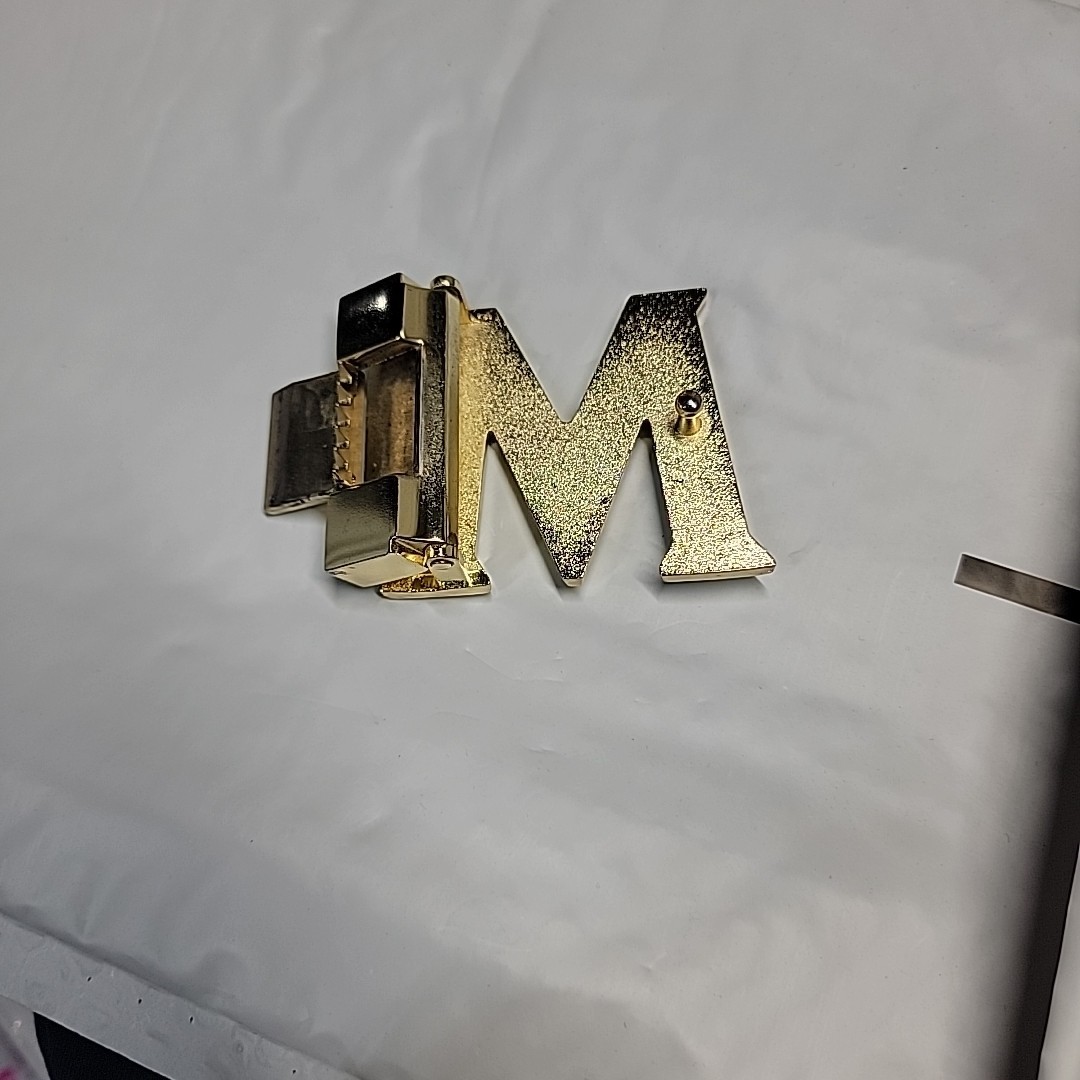 MCM gold logo reversible Belt Buckle Clean Not Too Bad Condition.