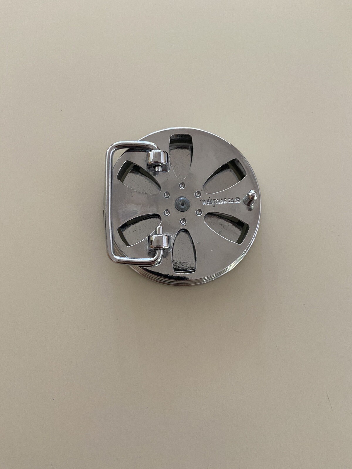 RARE SPINNING WHEEL RIM BUCKLE