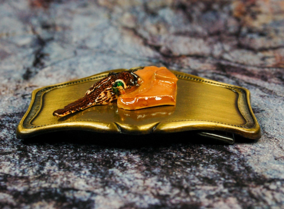 Retriever holding Pheasant 3D relief belt buckle vintage western AHM 1978