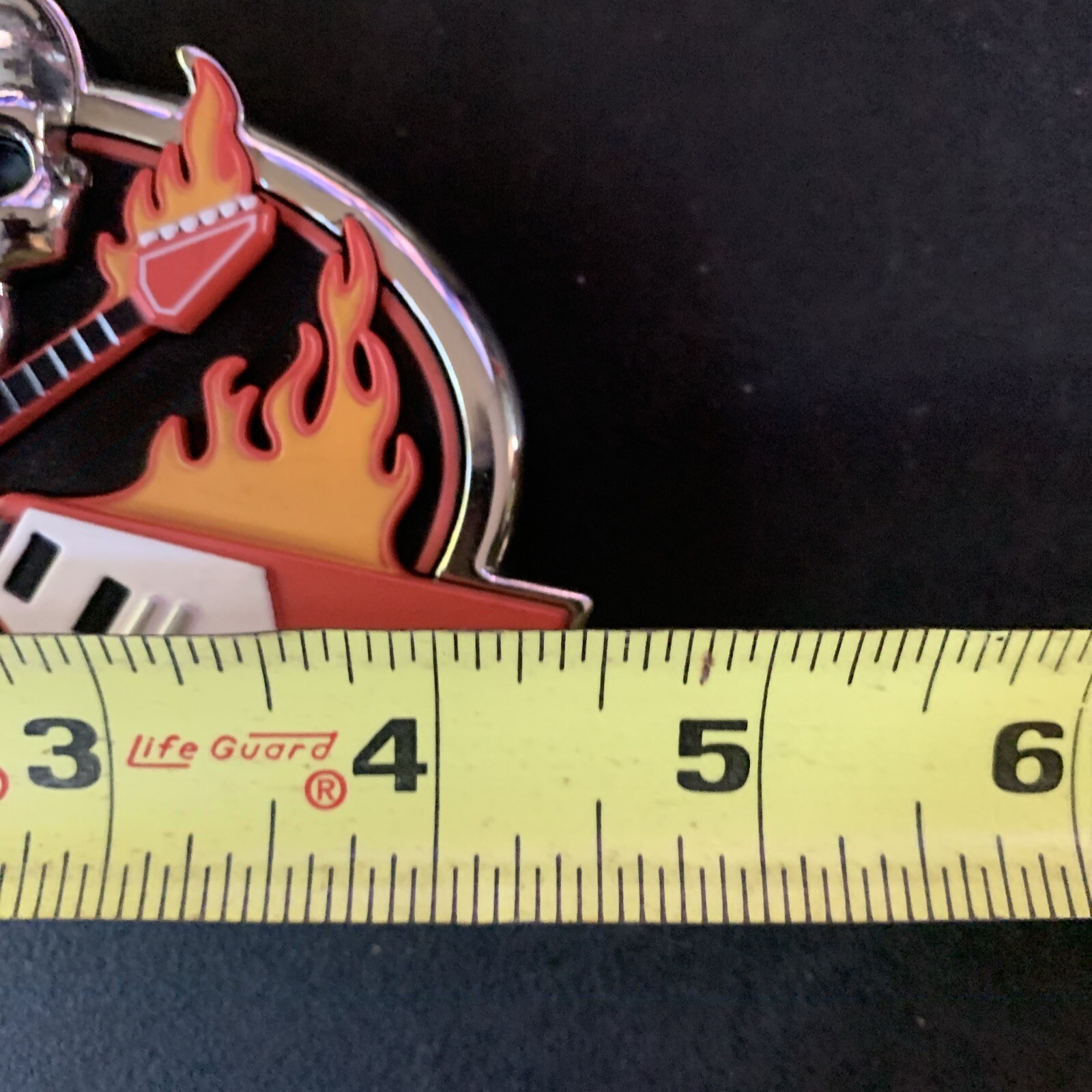 Plastic Guitar Hero Belt Buckle With Skull & Flames