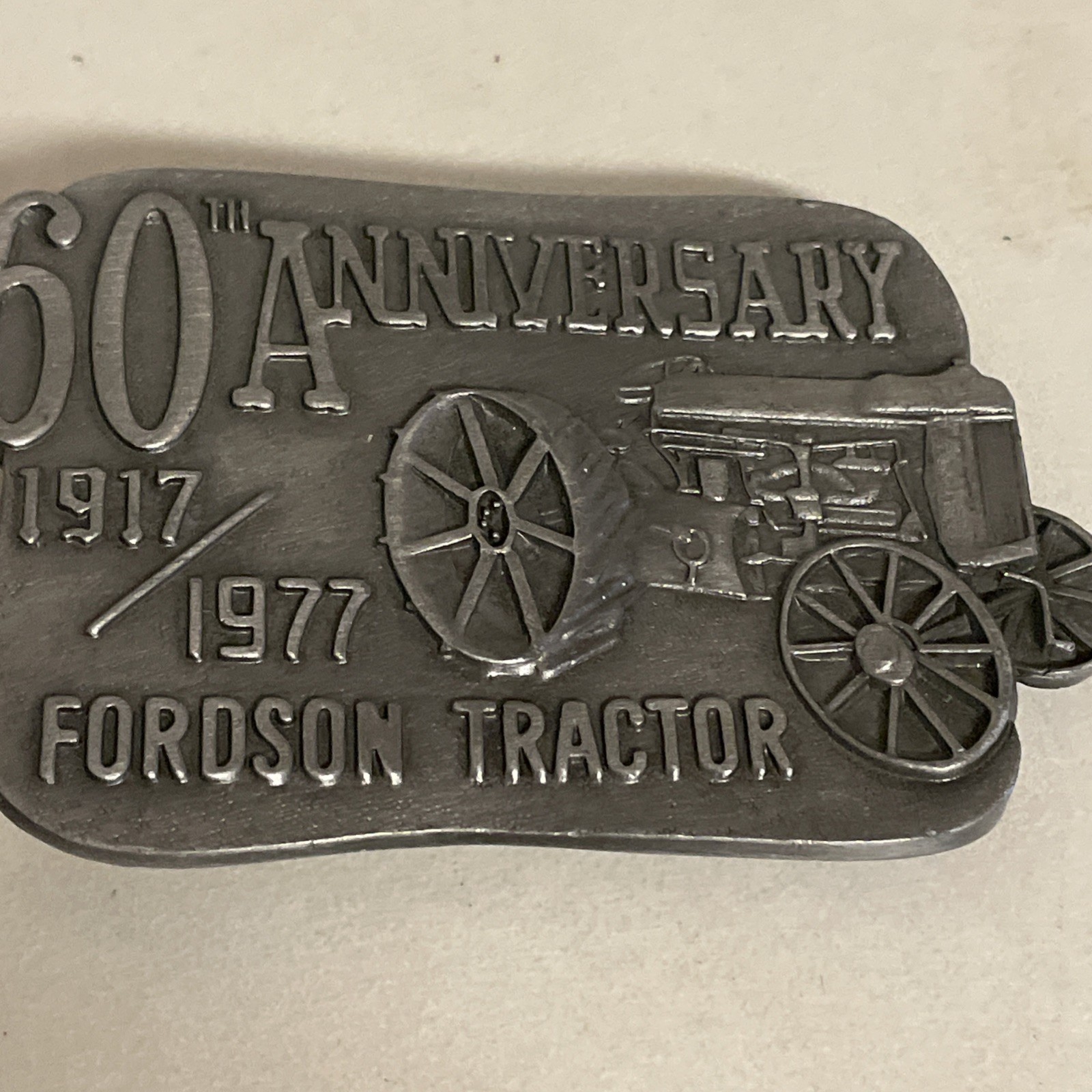 (1977) 60TH ANNIVERSARY FORDSON TRACTOR BELT BUCKLE – HEAVY METAL -2.5” x 3.25”