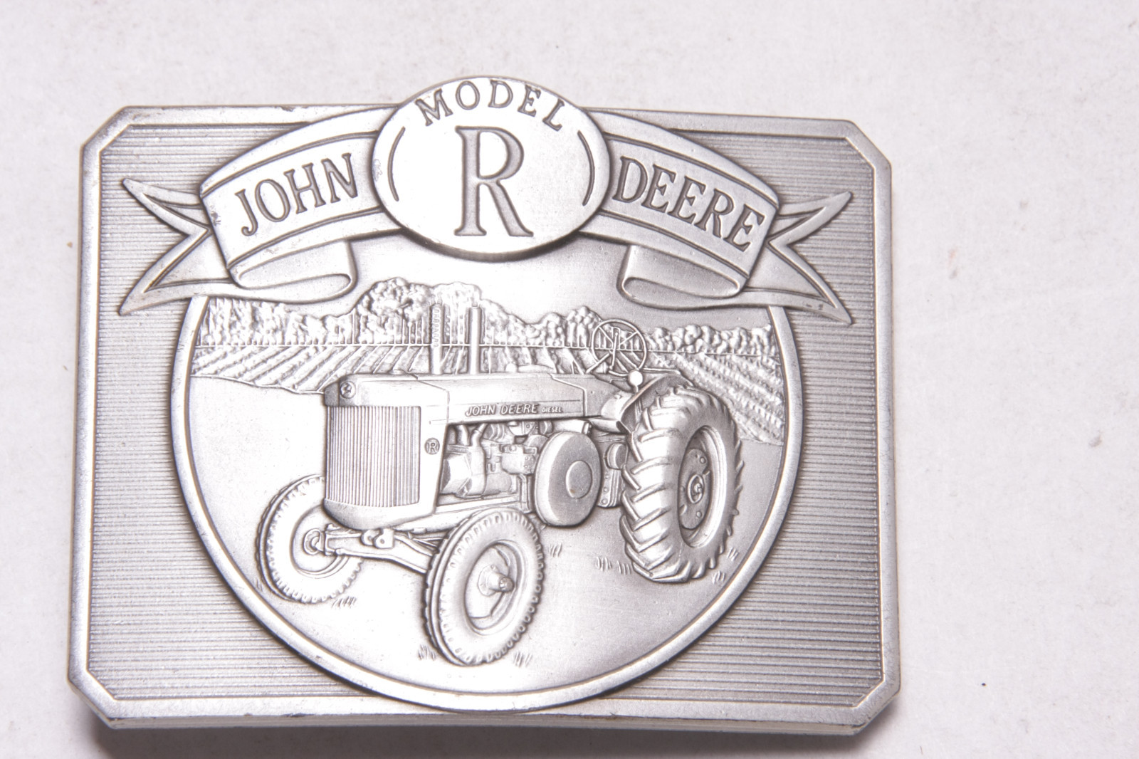 John Deere Model R 1990 Belt Buckle Heavy Metal – 2 1/2 x 3 1/8&Prime; – USED B281