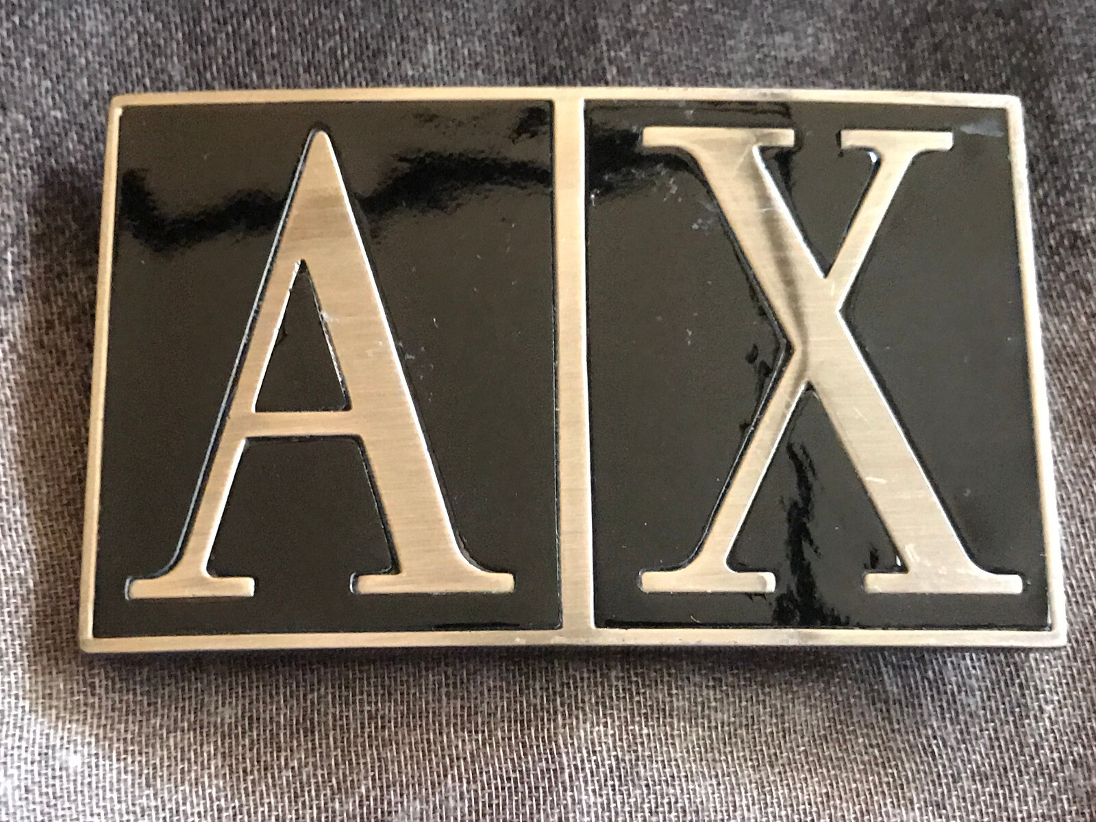 *** AX Silver-Tone/Black Enamel Logo Belt Buckle