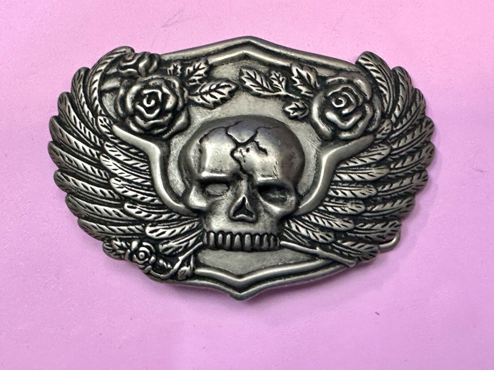 Dimensional Skull Head With Wings And Flowers – Raised Belt Buckle
