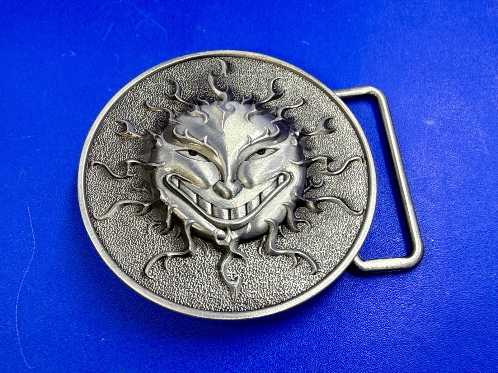 Flaming Sun Solar Flare Grinning Creepy Smile Novelty Belt Buckle by Buckle Rage