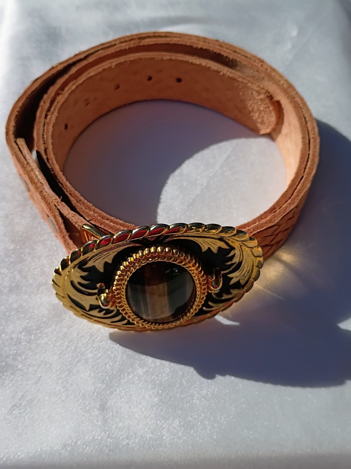 Tooled leather belt with western gold toned buckle w/tiger eye embellishment
