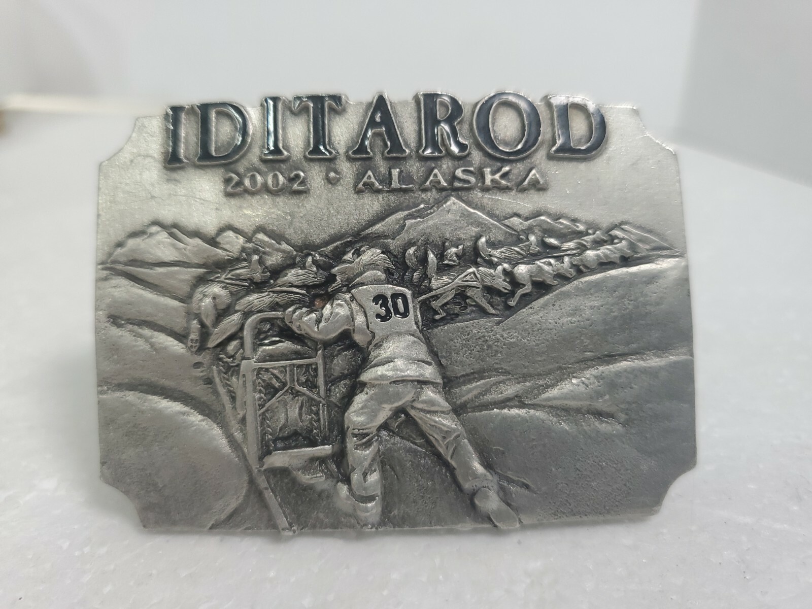 Official 2002 Iditarod Trail metal belt buckle