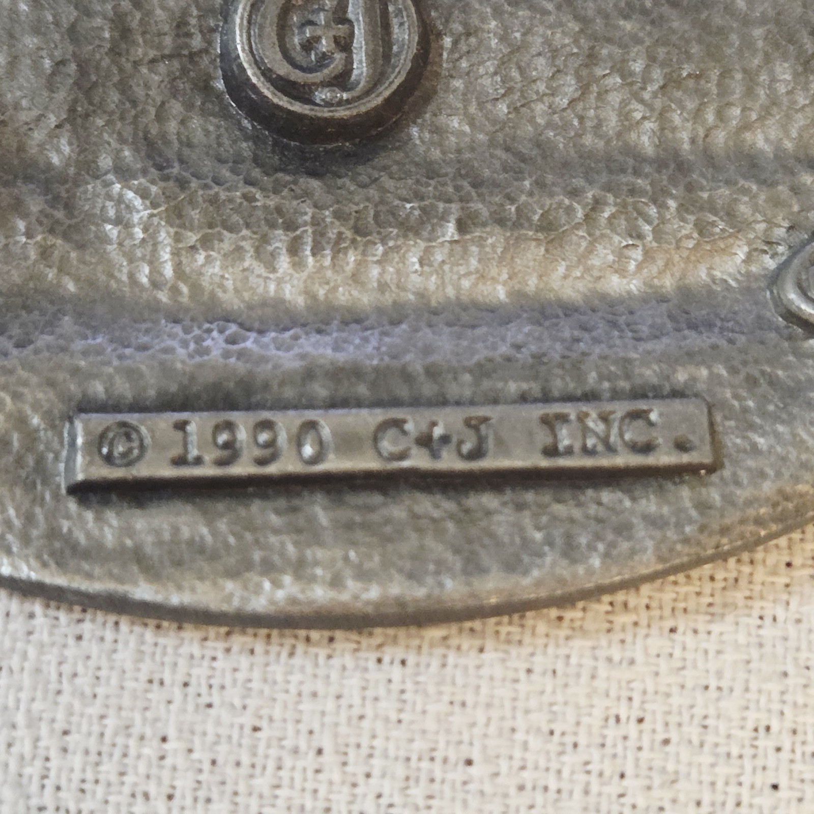Belt Buckle – C+J Inc. 1990 Snowmobiler (with wear)