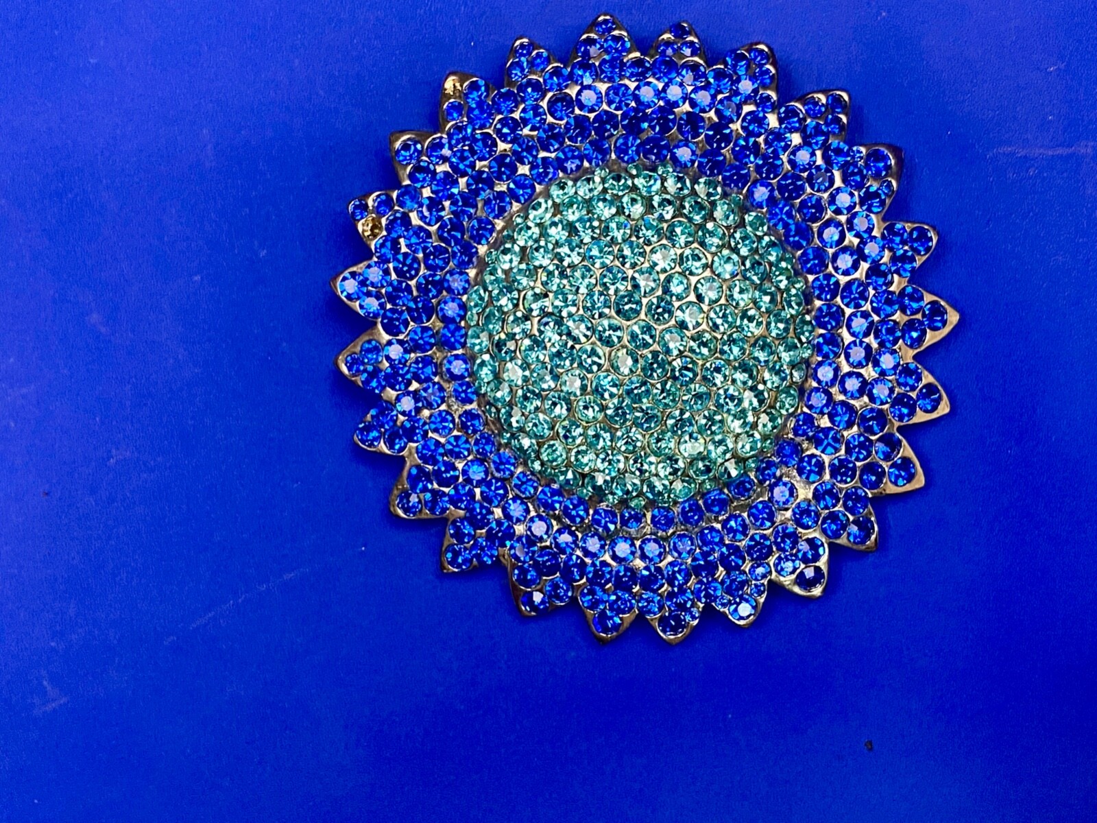 A Blue Green Sea Of Rhinestones – Starburst Cutout Vintage Belt Buckle