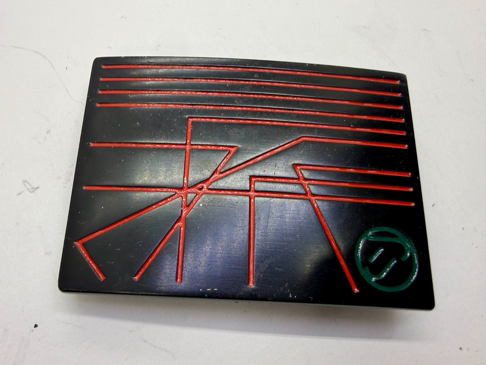 Unknown to me! Geometric Abstract Lines Red Over a Black Enamel Belt Buckle