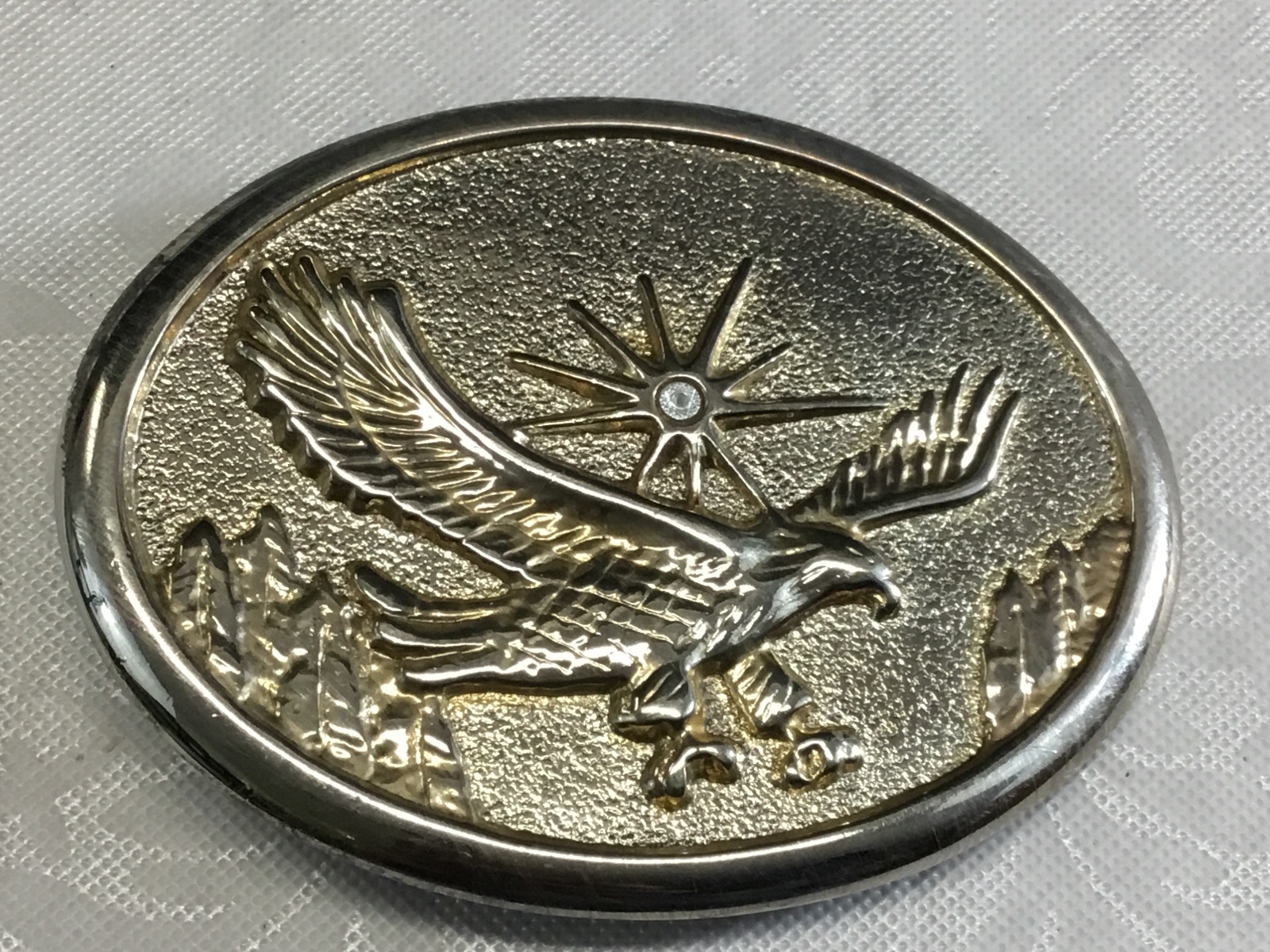 Vintage patriotic flying classic Bald Eagle with sun starburst belt buckle