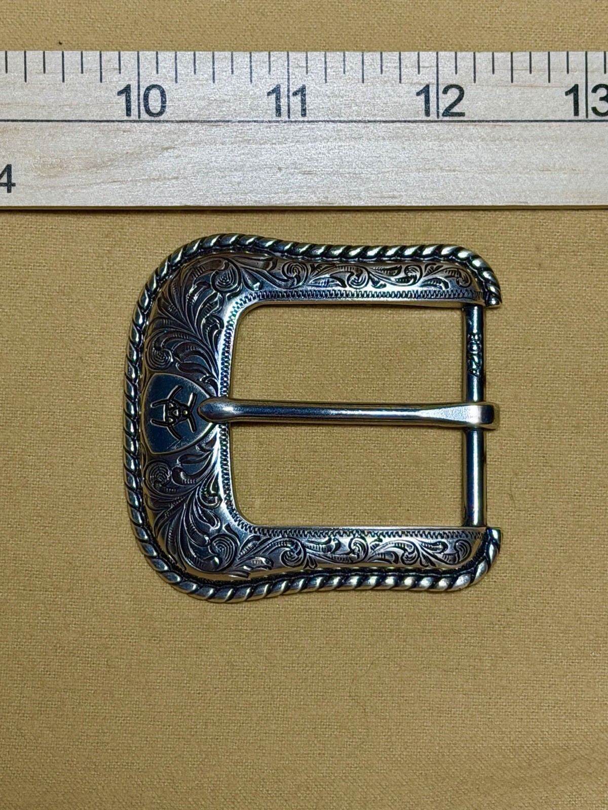 Ariat Western Belt Buckle Filigree Scroll Logo Silver Toned Rope Edge