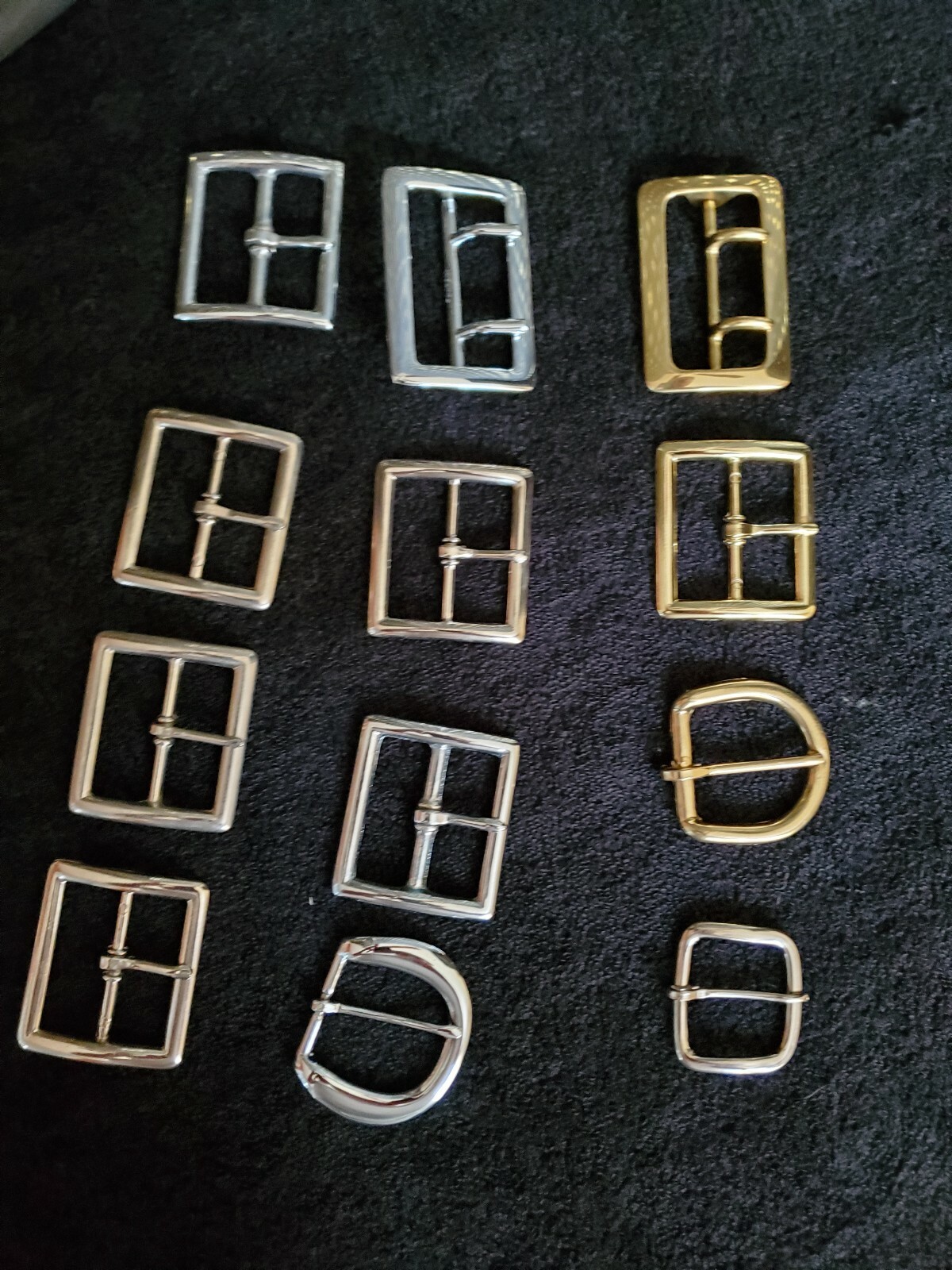 12 assorted Belt buckles