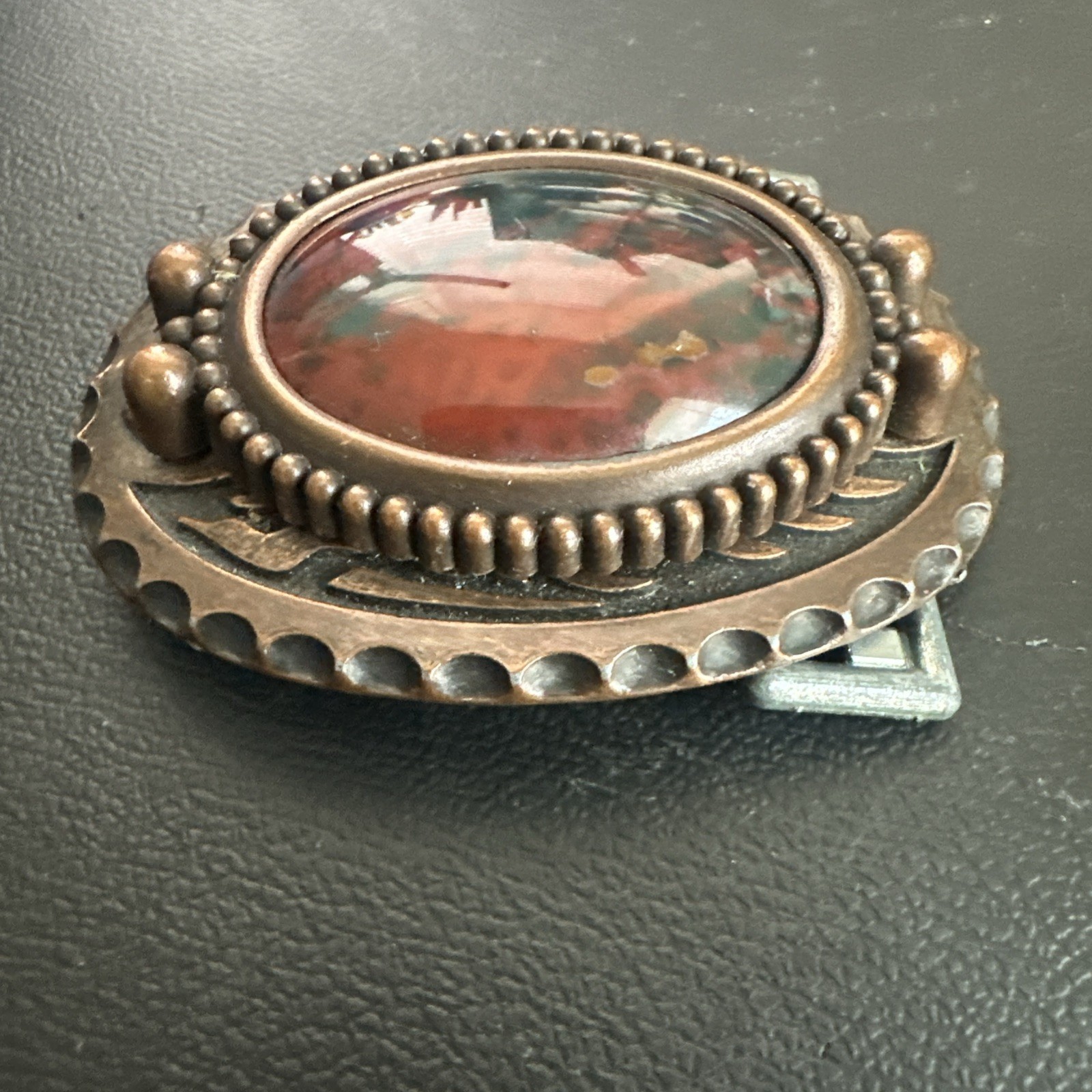 vtg ornate oval belt buckle With polished red & Green Center stone Agate?