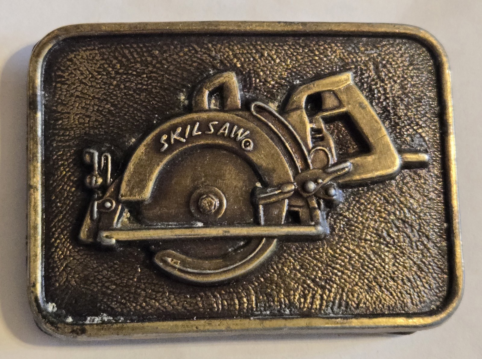 Vintage Used SKILSAW belt buckle circular saw Skil Corp Chicago IL Illinois A7