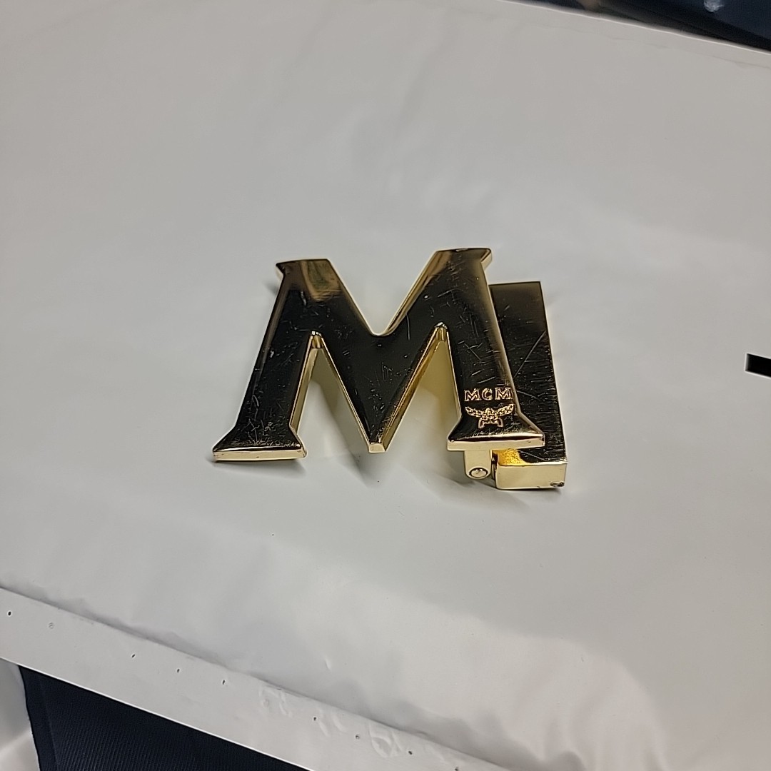 MCM gold logo reversible Belt Buckle Clean Not Too Bad Condition.