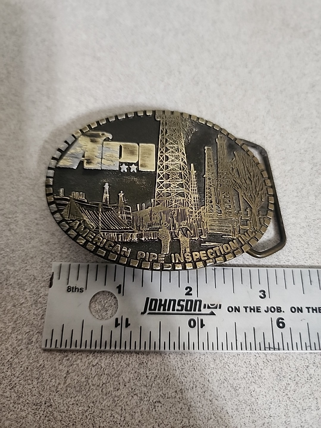 Vtg 1977 AMERICAN PIPE INSPECTION INC. Belt Buckle By MAGICAST USA