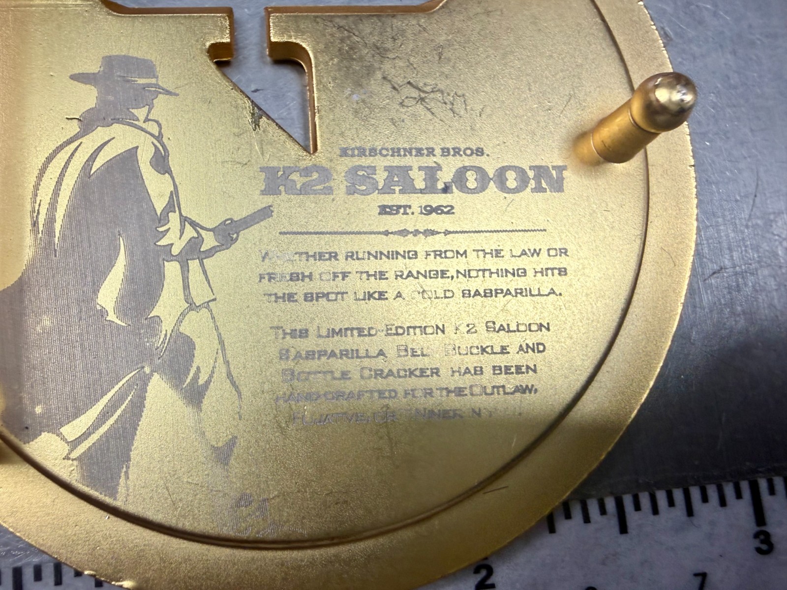 K2 Saloon by Kirschner Limited Edition Sarsaparilla Outlaw Opener & Belt Buckle