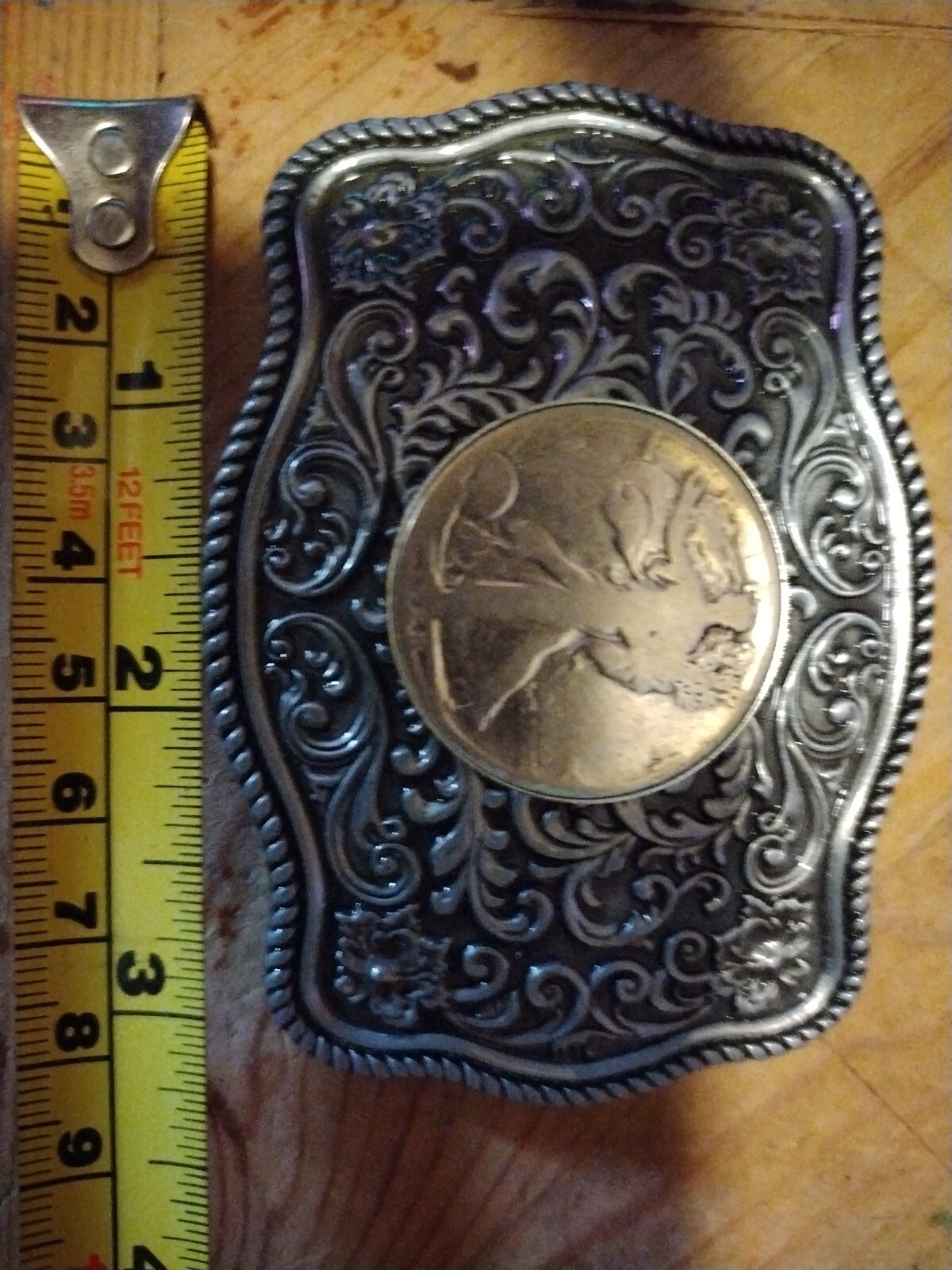 Western style belt buckle.steel with a walking liberty silver coin. 