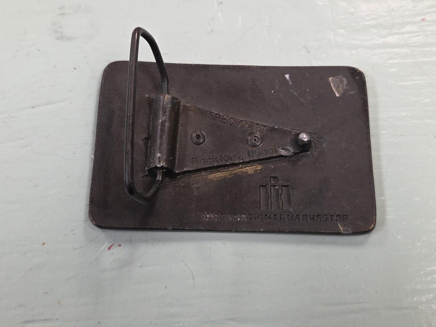INTERNATIONAL HARVERSTER Spec Cast belt buckle USA TRACTOR farming BRASS western