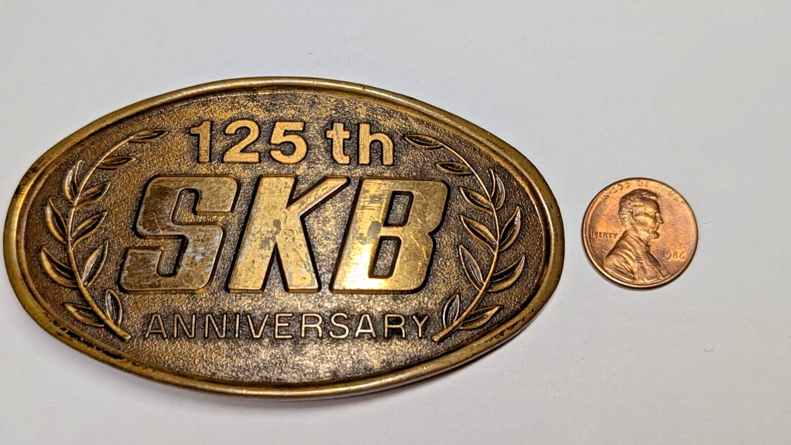 VINTAGE 125TH ANNIVERSARY SKB BELT BUCKLE