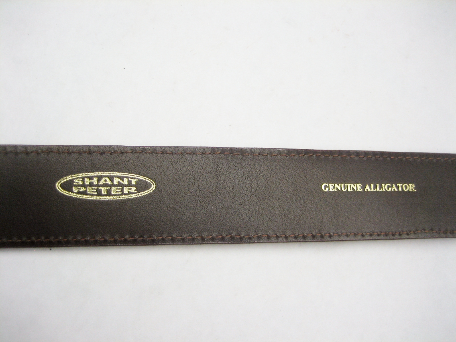 Genuine Alligator belt size 26 to 46. 1-1/4 tapered to 1&Prime;, for 1&Prime; buckle U.S.A.