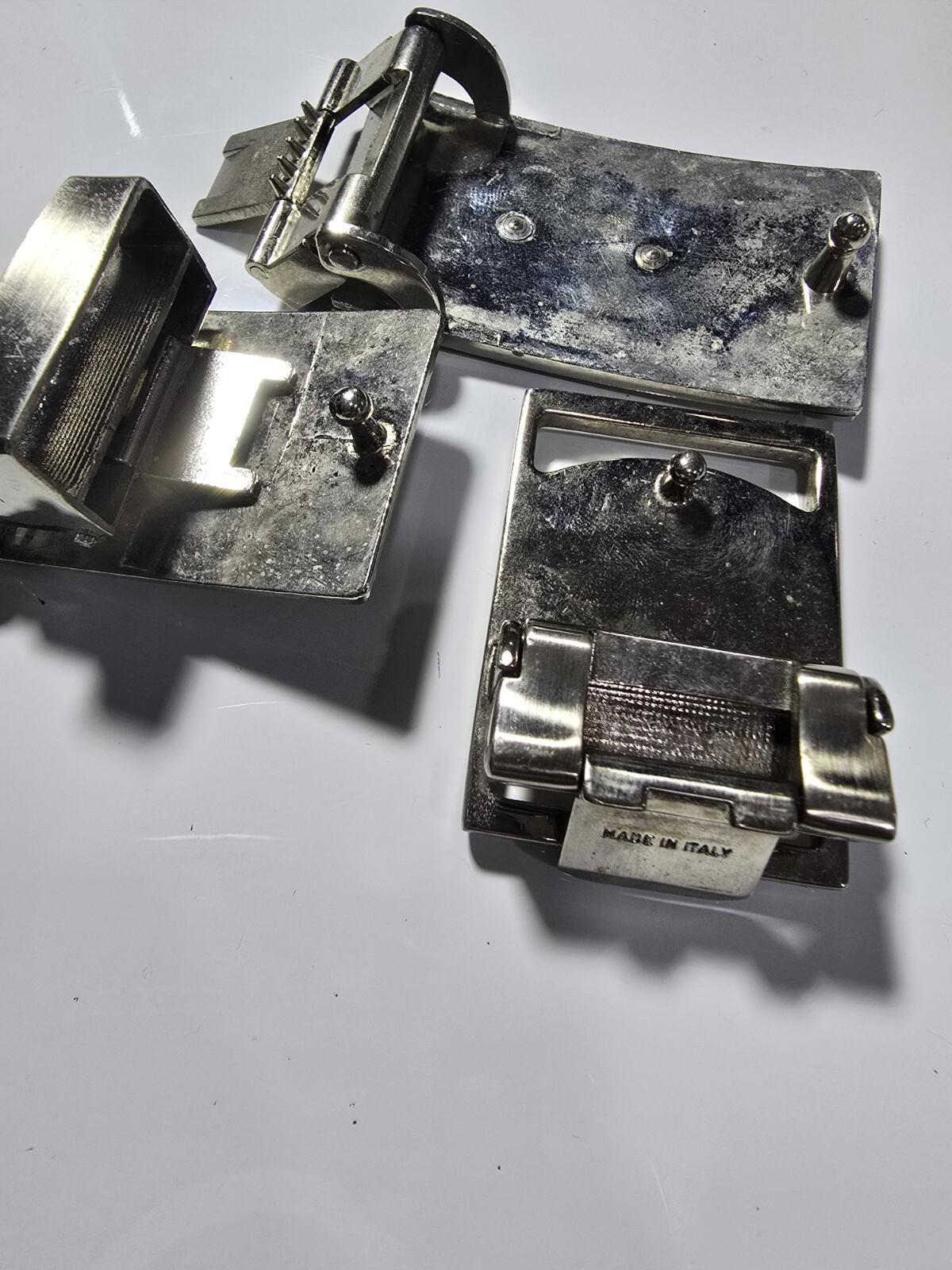 BELT BUCKLES LOT OF 3 VERSACE, FERRAGAMO, AND LACOSTE ITALY