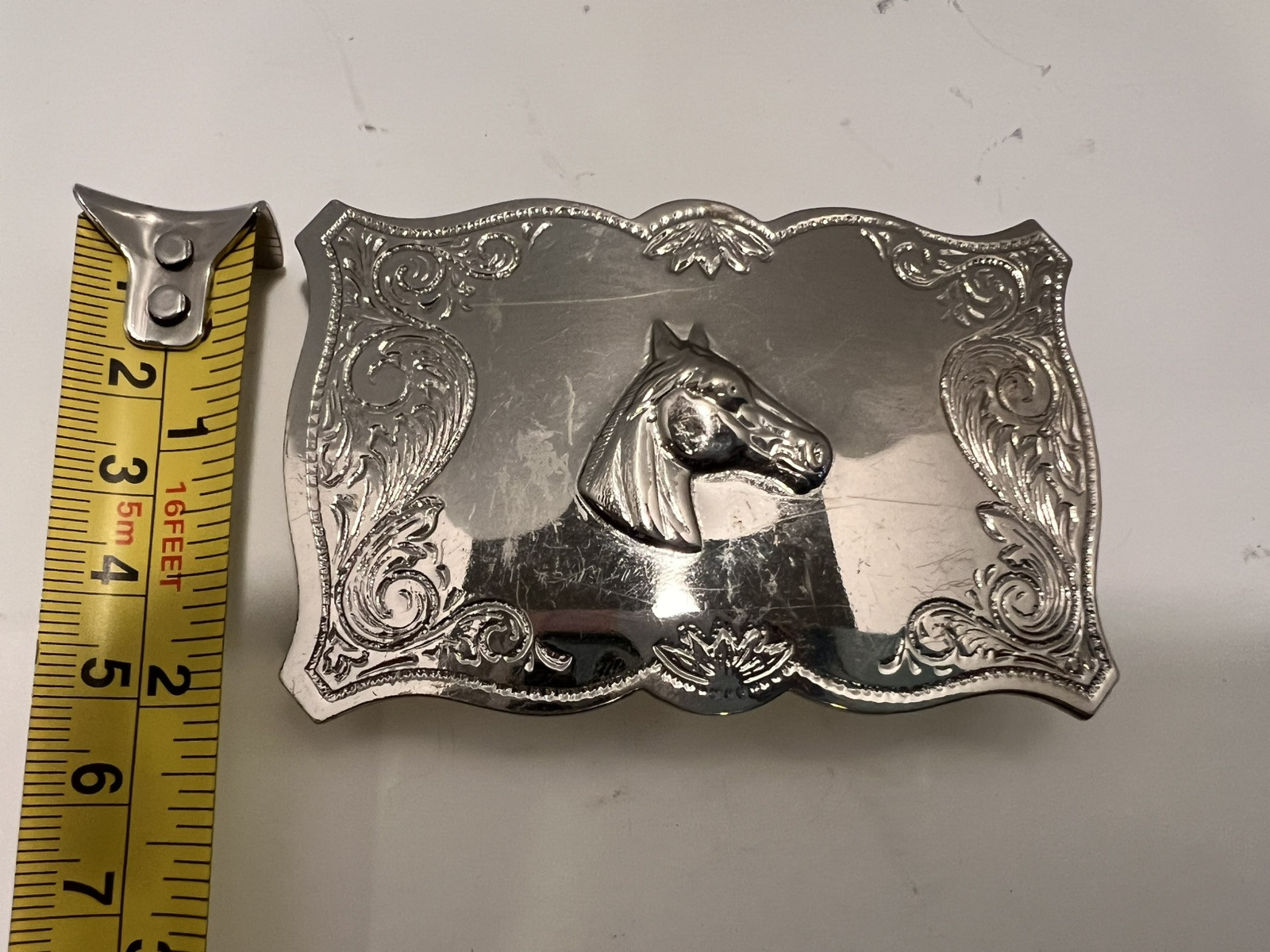 Lightweight Metal Horsehead Belt Buckle. Unbranded