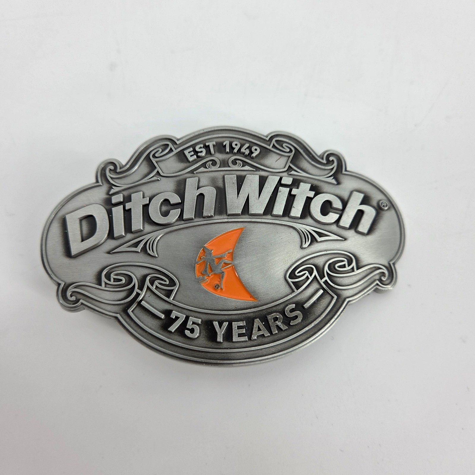 Ditch Witch Construction 75 Year Anniversary Belt Buckle Metal Logo Collectible
