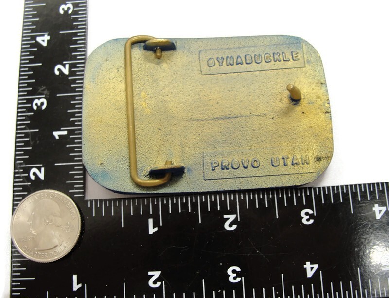 RM Rocky Mountain Machinery Co Blue & Gold Tone Belt Buckle Dynabuckle Utah