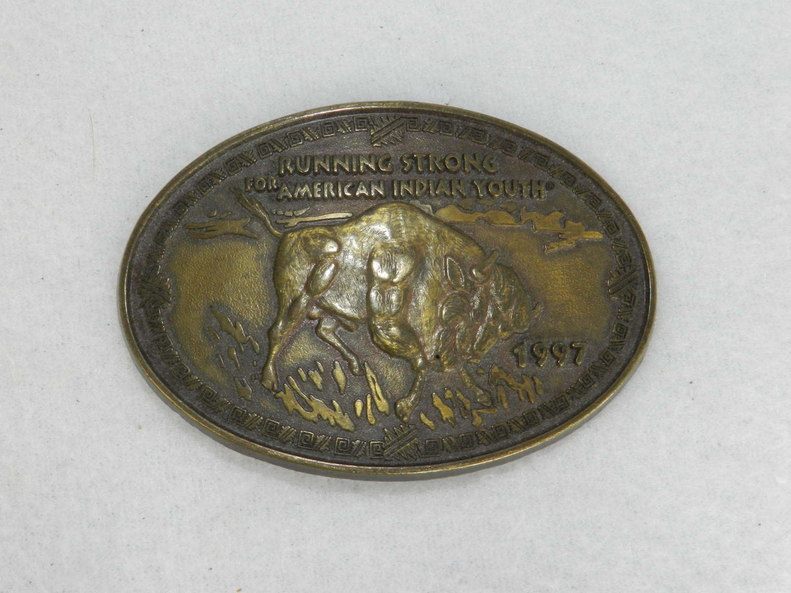 Buffalo Belt Buckle – Running Strong for American Indian Youth 1997 – Brass