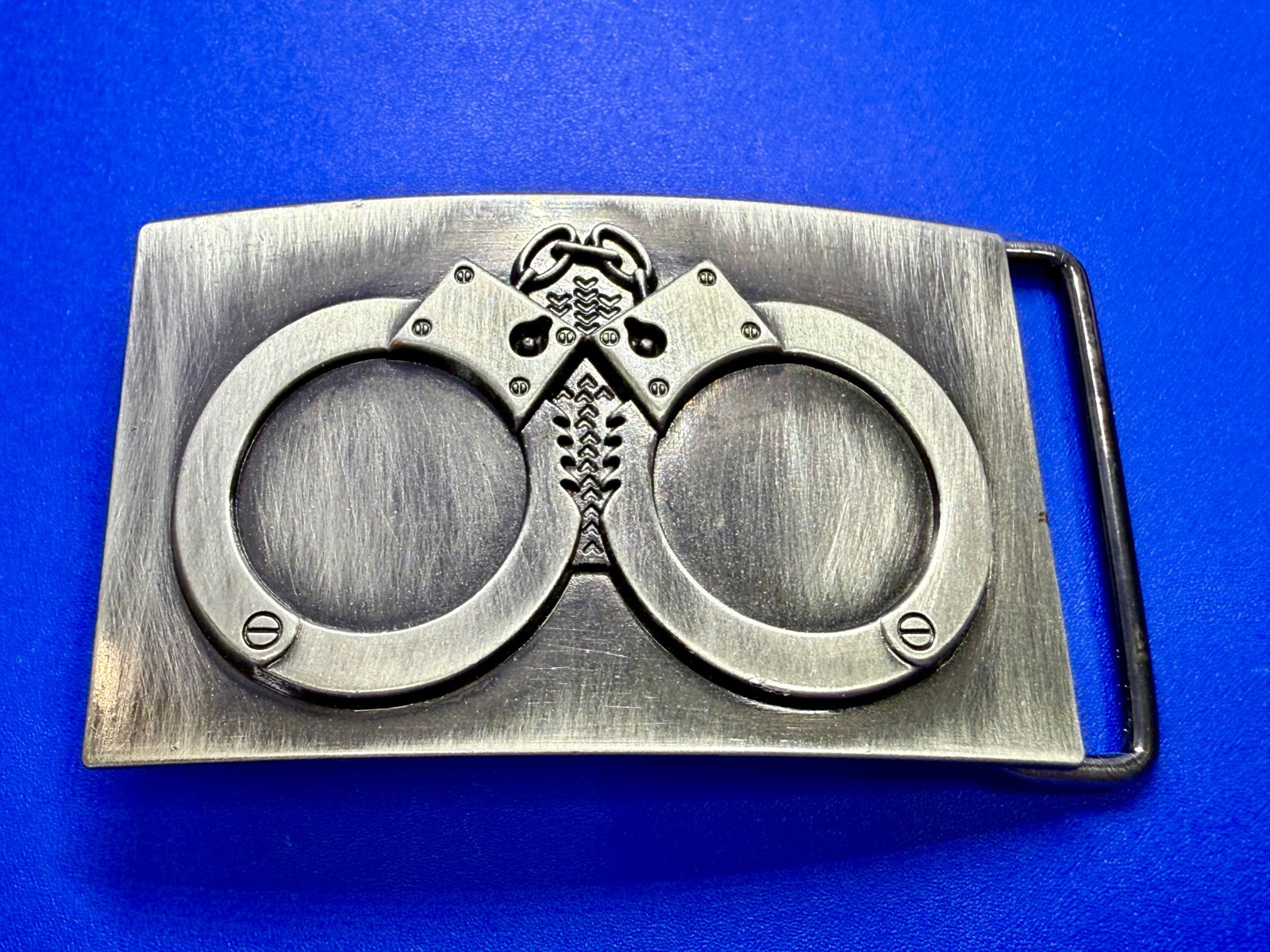 Hand Cuffs Raised Handcuffs on Silver Color Rectangular Belt Buckle