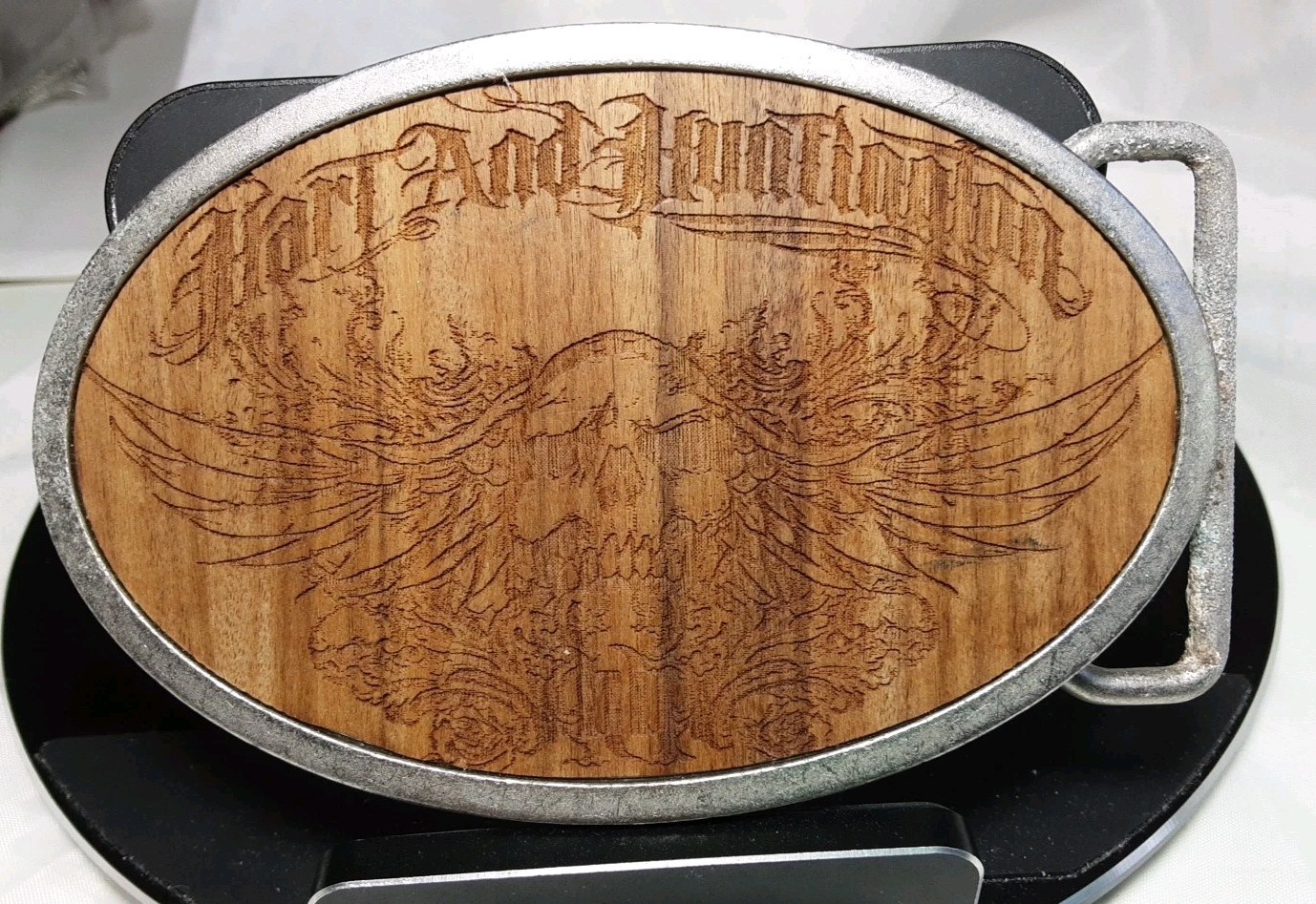 Belt Buckle Silver Tone Hart & Huntington Tattoo Co. Etched Wood Skull Wings