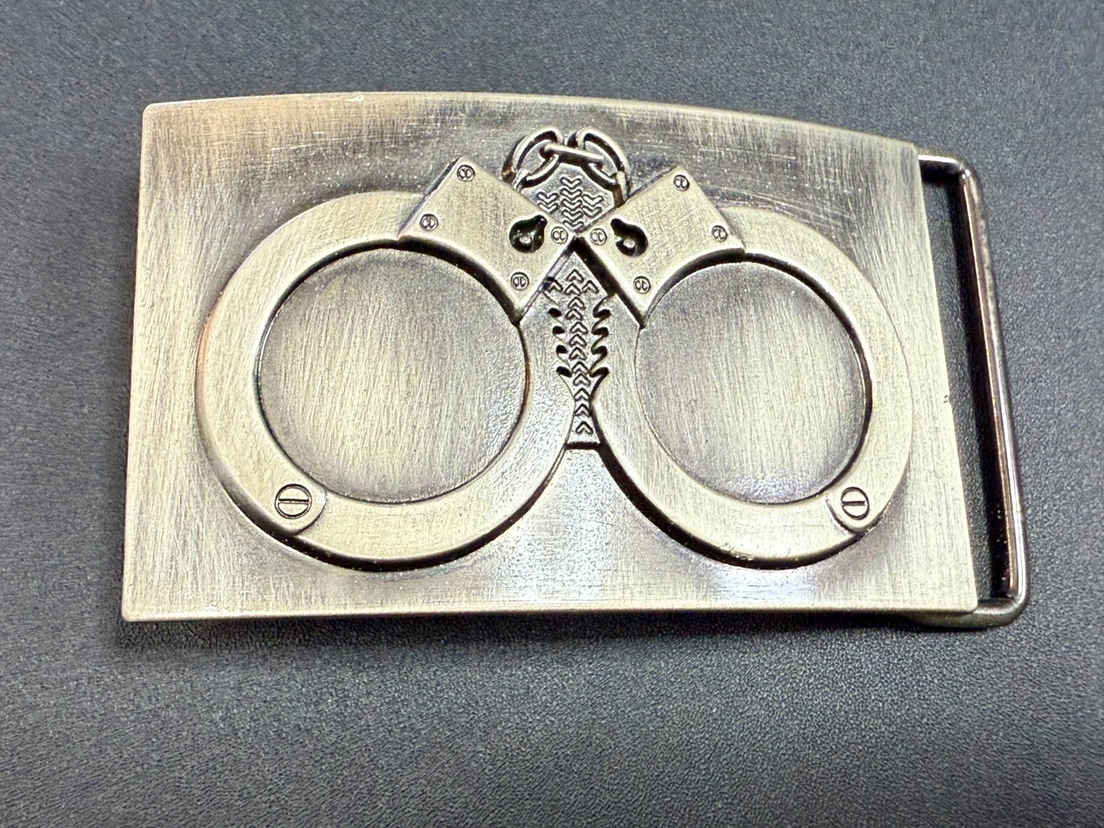 Hand Cuffs Raised Handcuffs on Silver Color Rectangular Belt Buckle