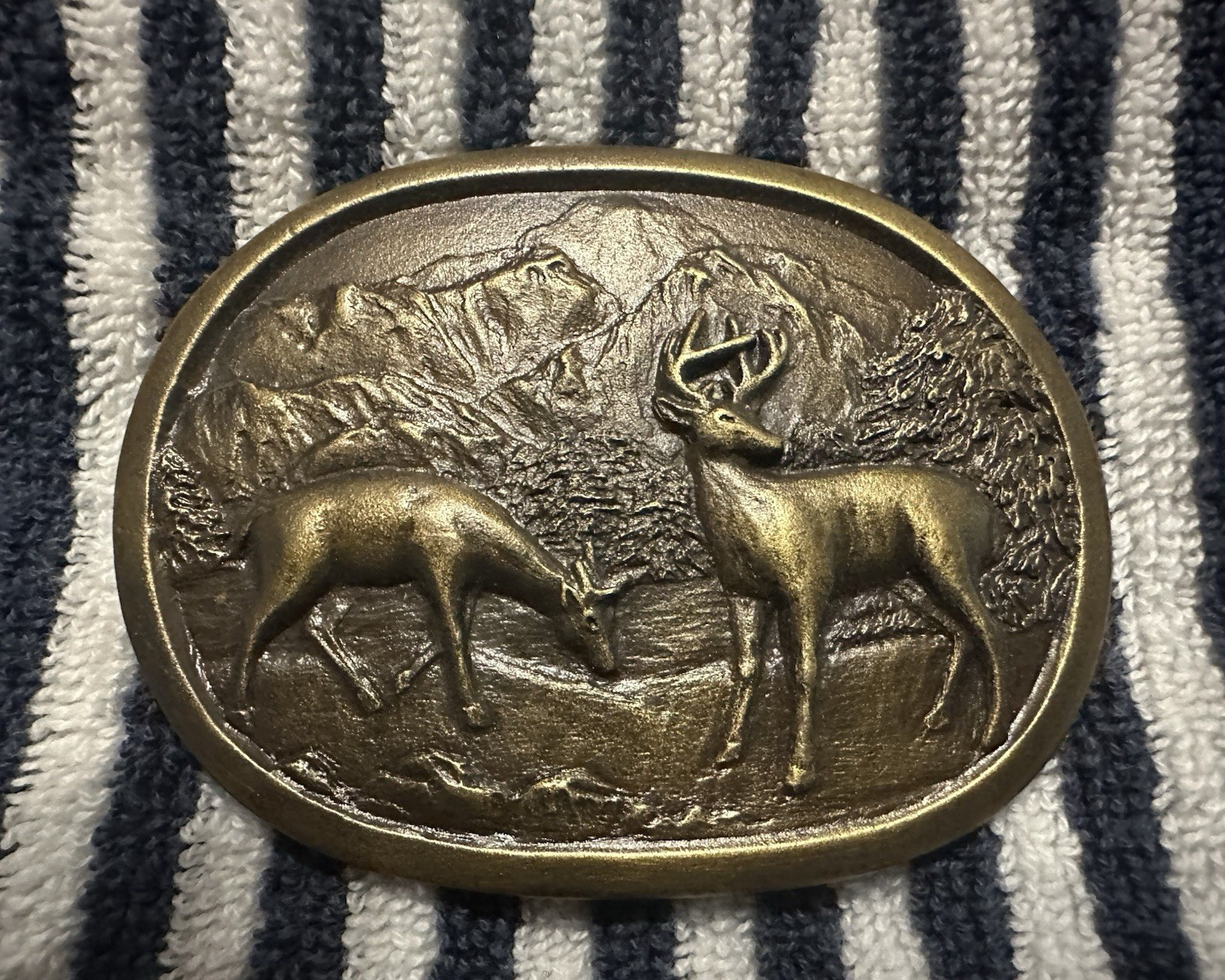 Indiana Metal Craft Oval Western Deer Mountain Scene Belt Buckle Bronze E-357