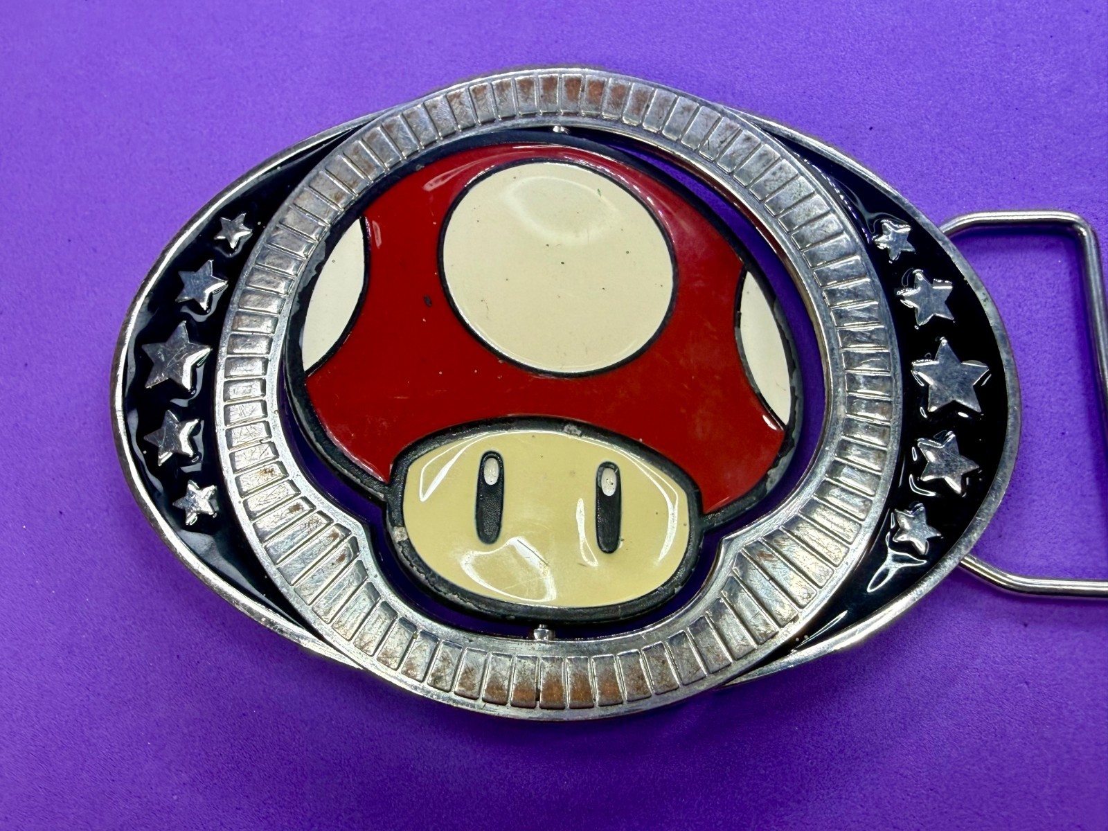 Nintendo Super Mario Bros Game Spinning Mushroom Reversible Novelty Belt Buckle