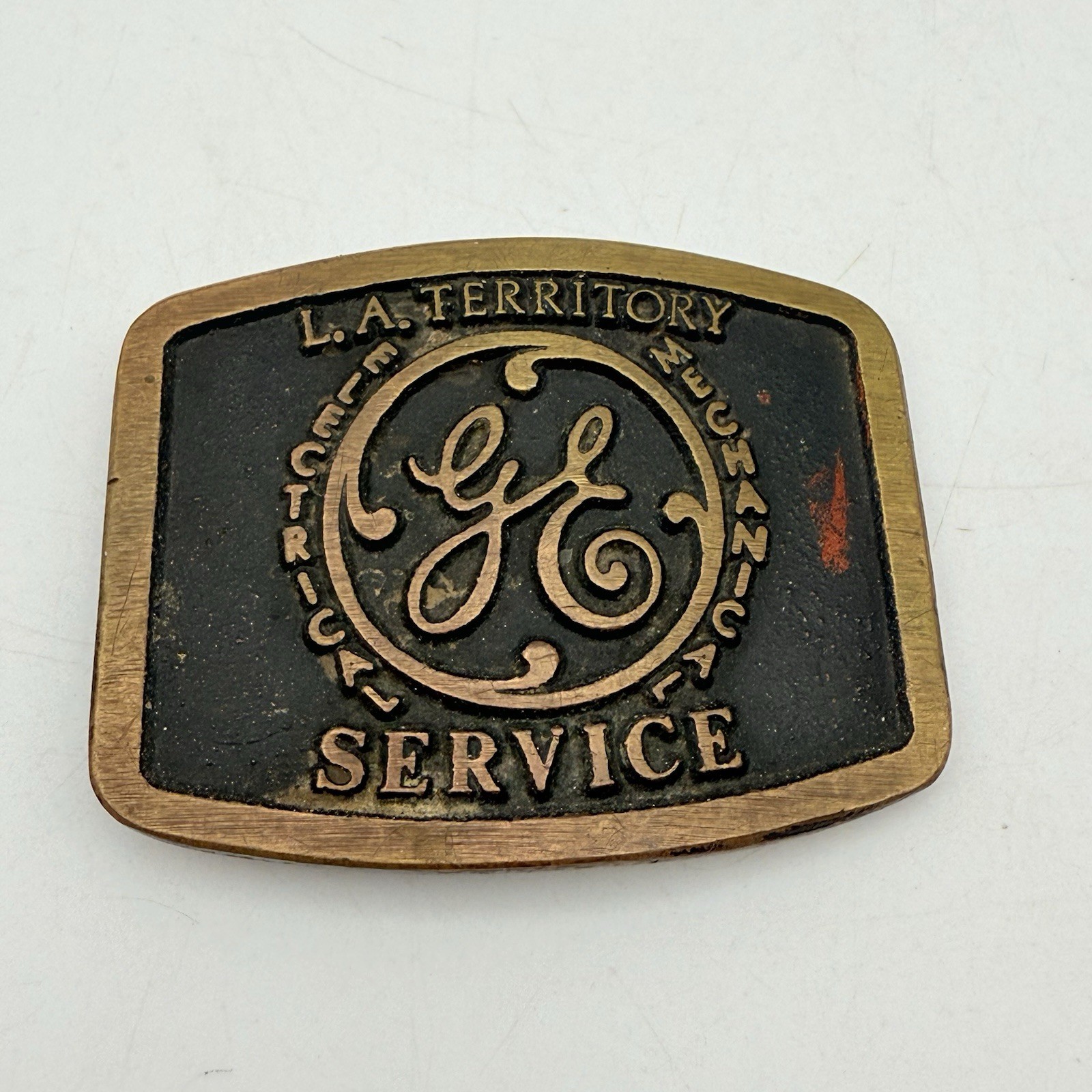 vintage 1970s western GE belt buckle SOLID BRASS cowboy “LA TERRITORY”