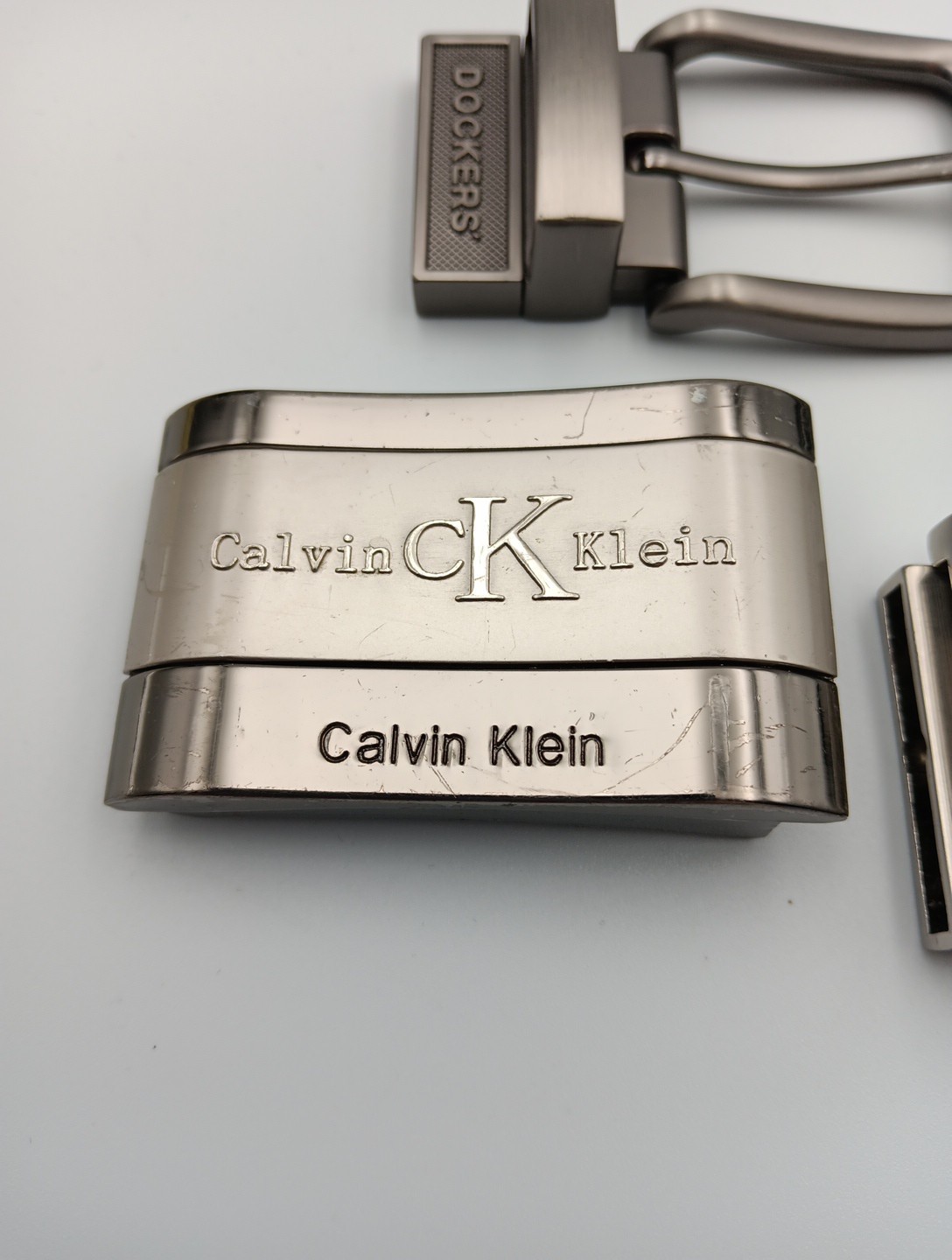 Lot of 4 Mens Assorted Designer Brands Chrome Metal Silver Belt Buckles